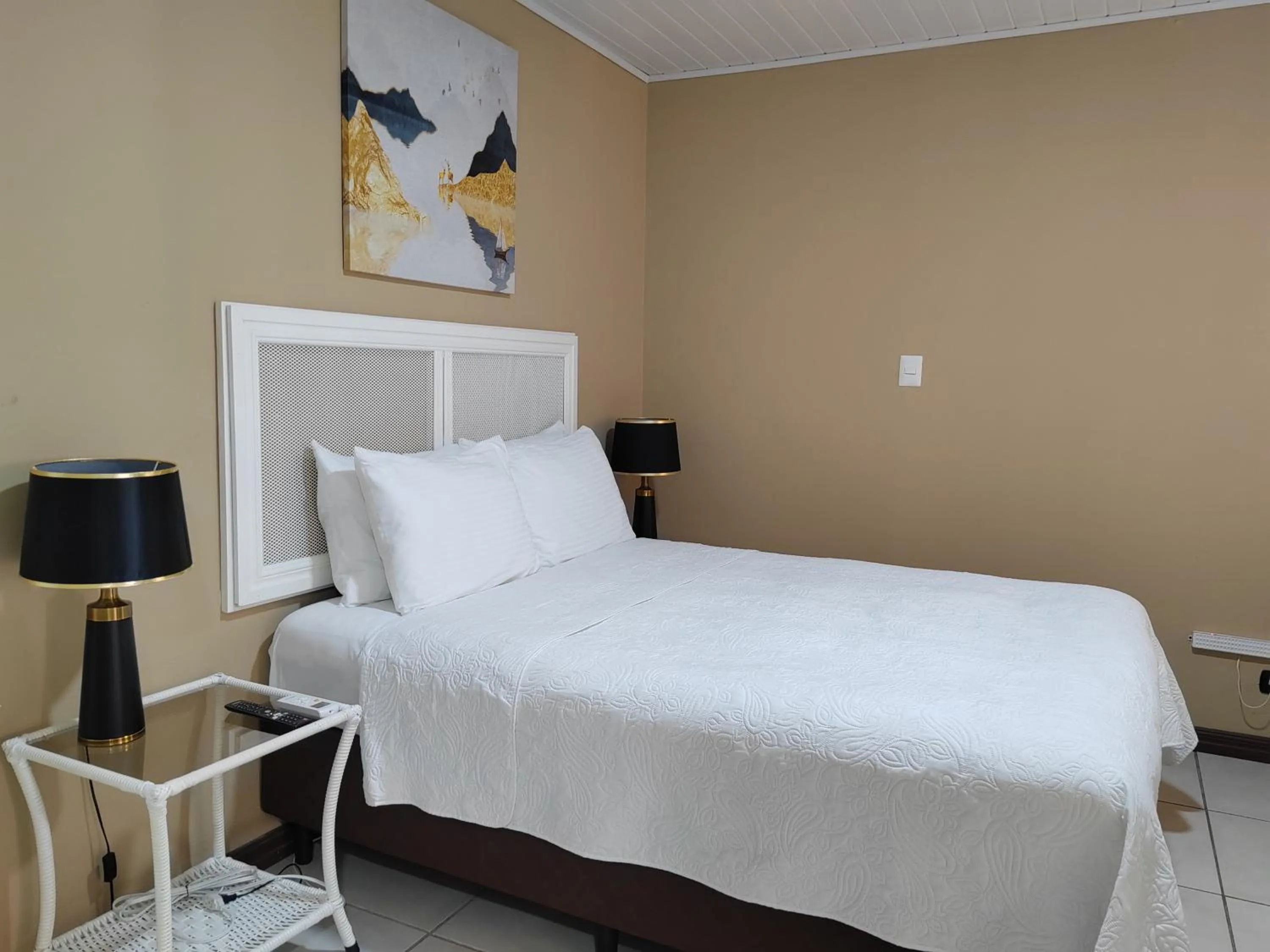 Bed in Hotel Bamboo Aeropuerto