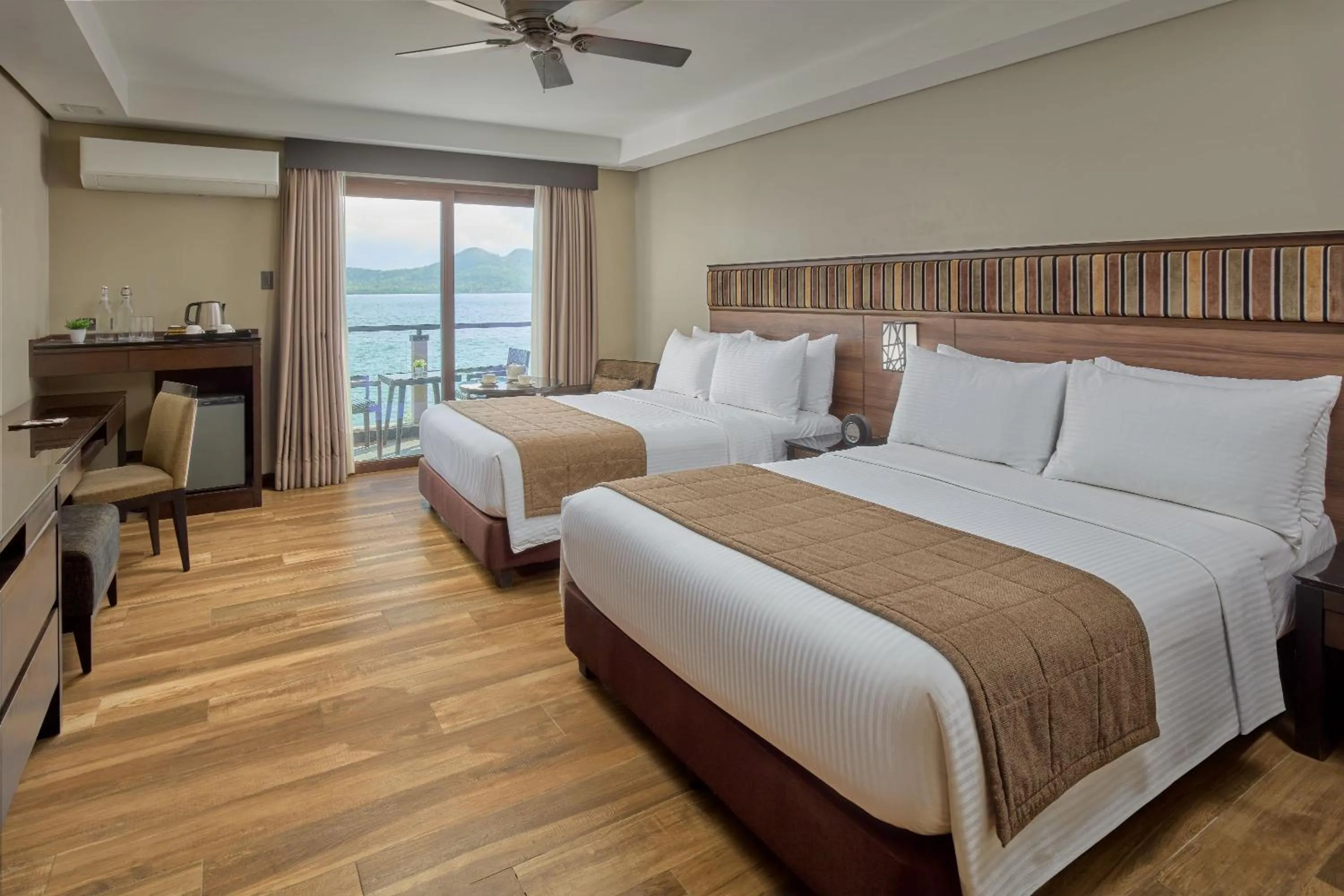 Bed in Two Seasons Coron Bayside Hotel