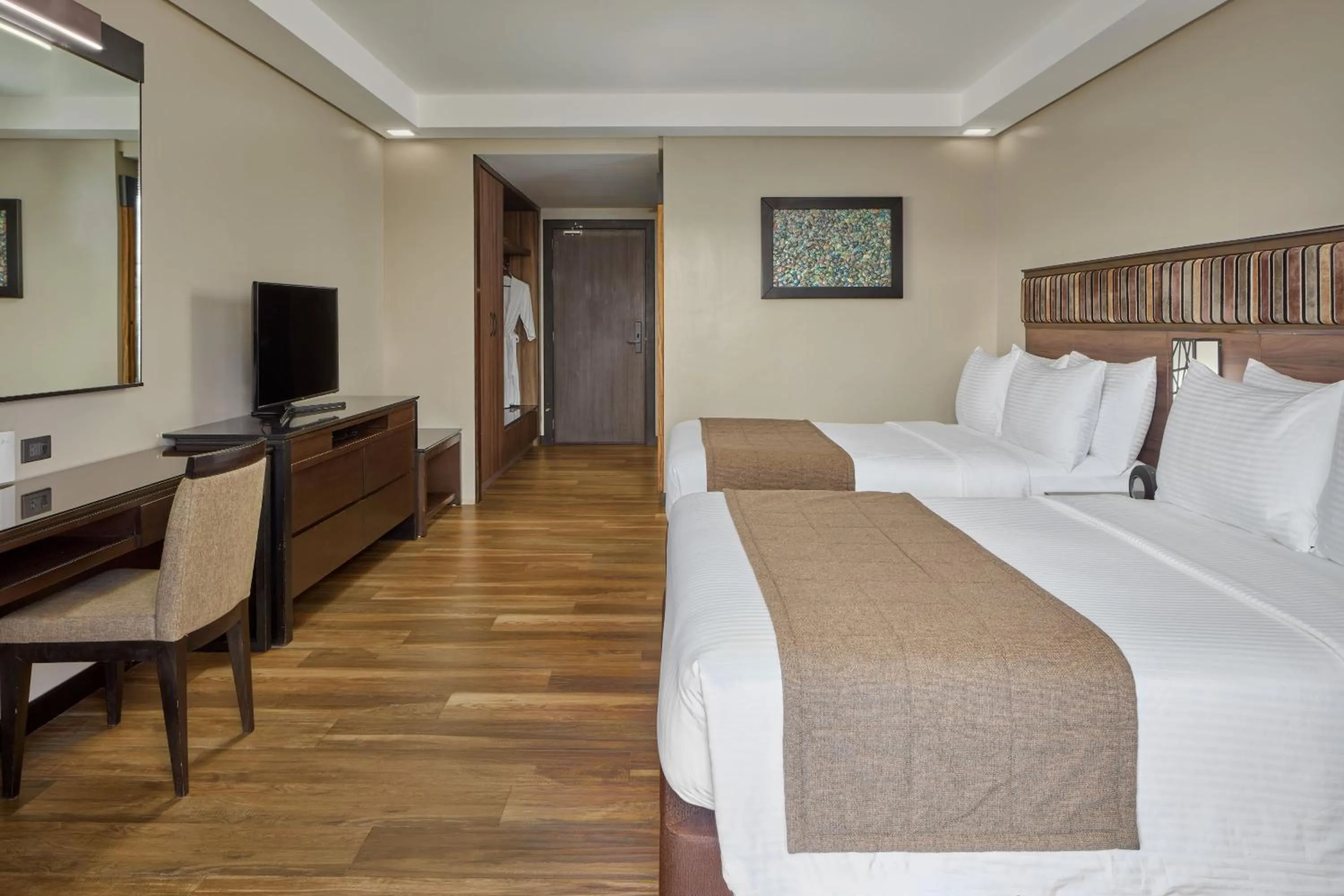 Bed in Two Seasons Coron Bayside Hotel