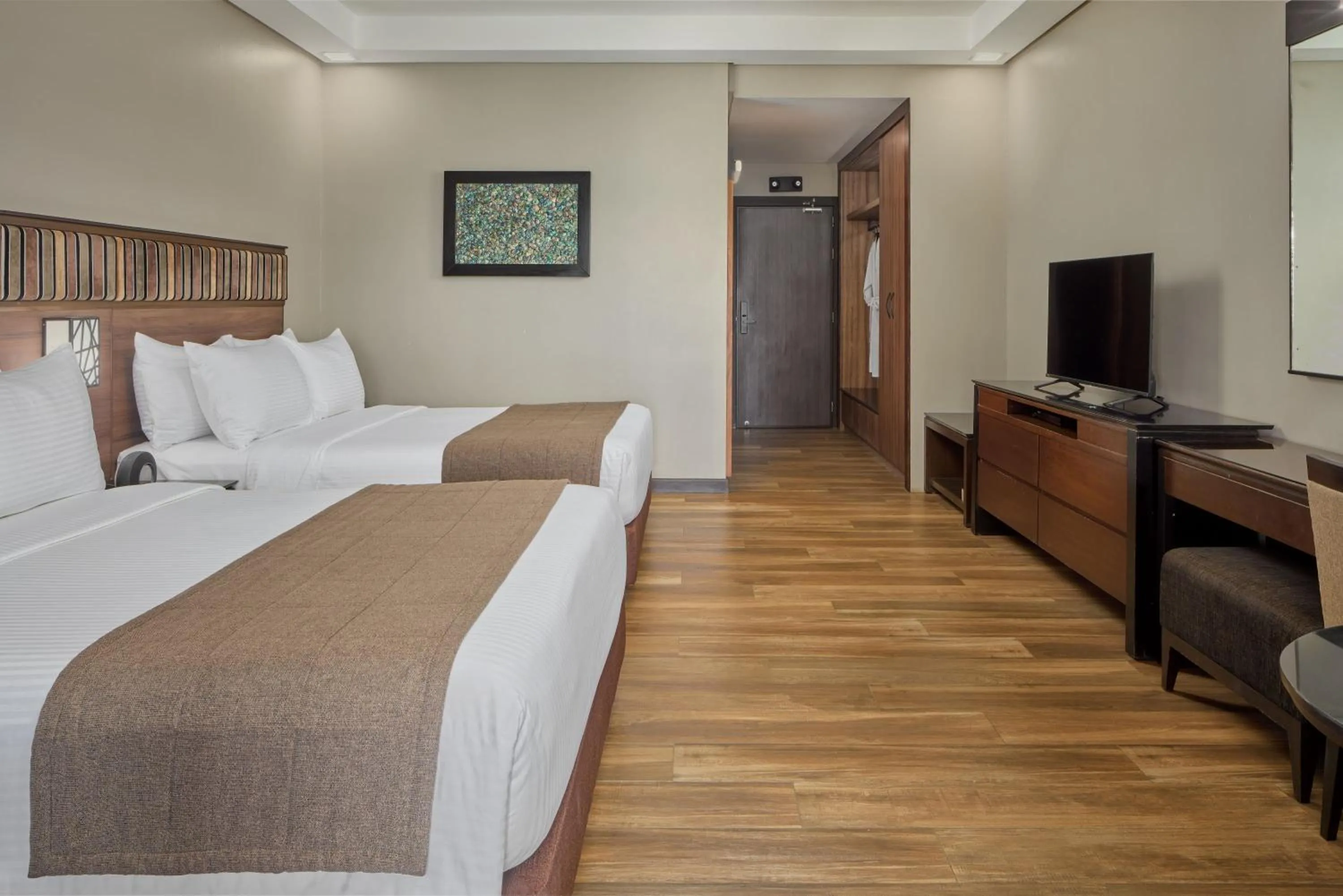 Bed in Two Seasons Coron Bayside Hotel