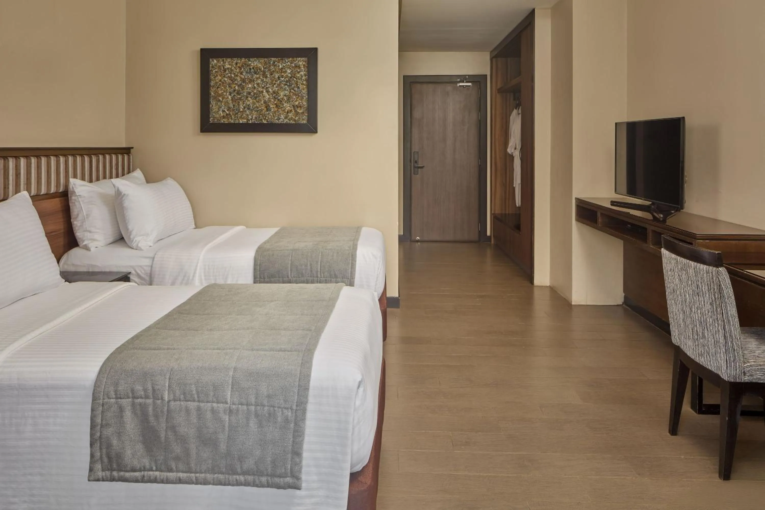 Bed in Two Seasons Coron Bayside Hotel