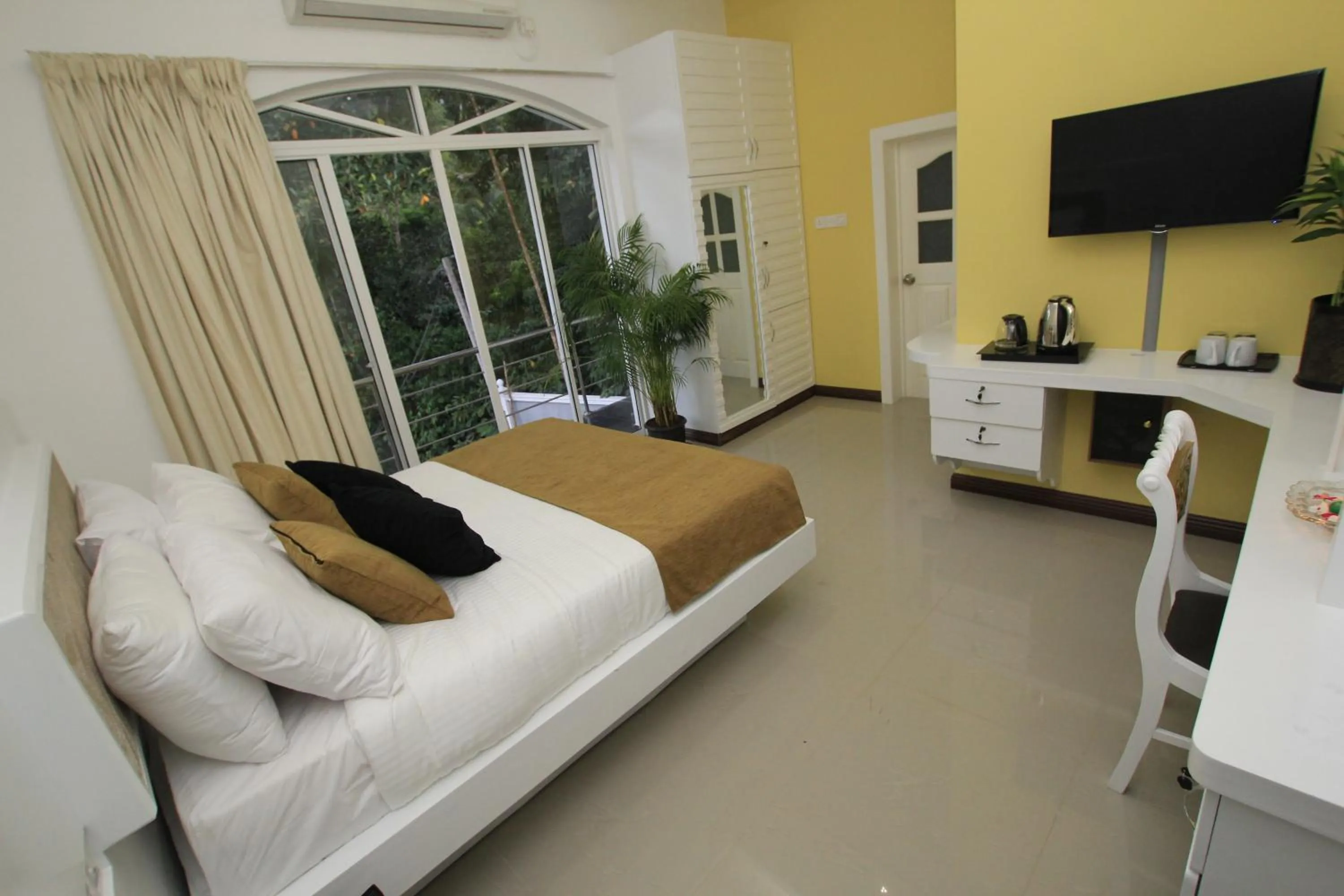 Balcony/Terrace, Bed in Ayaana Boutique Hotel