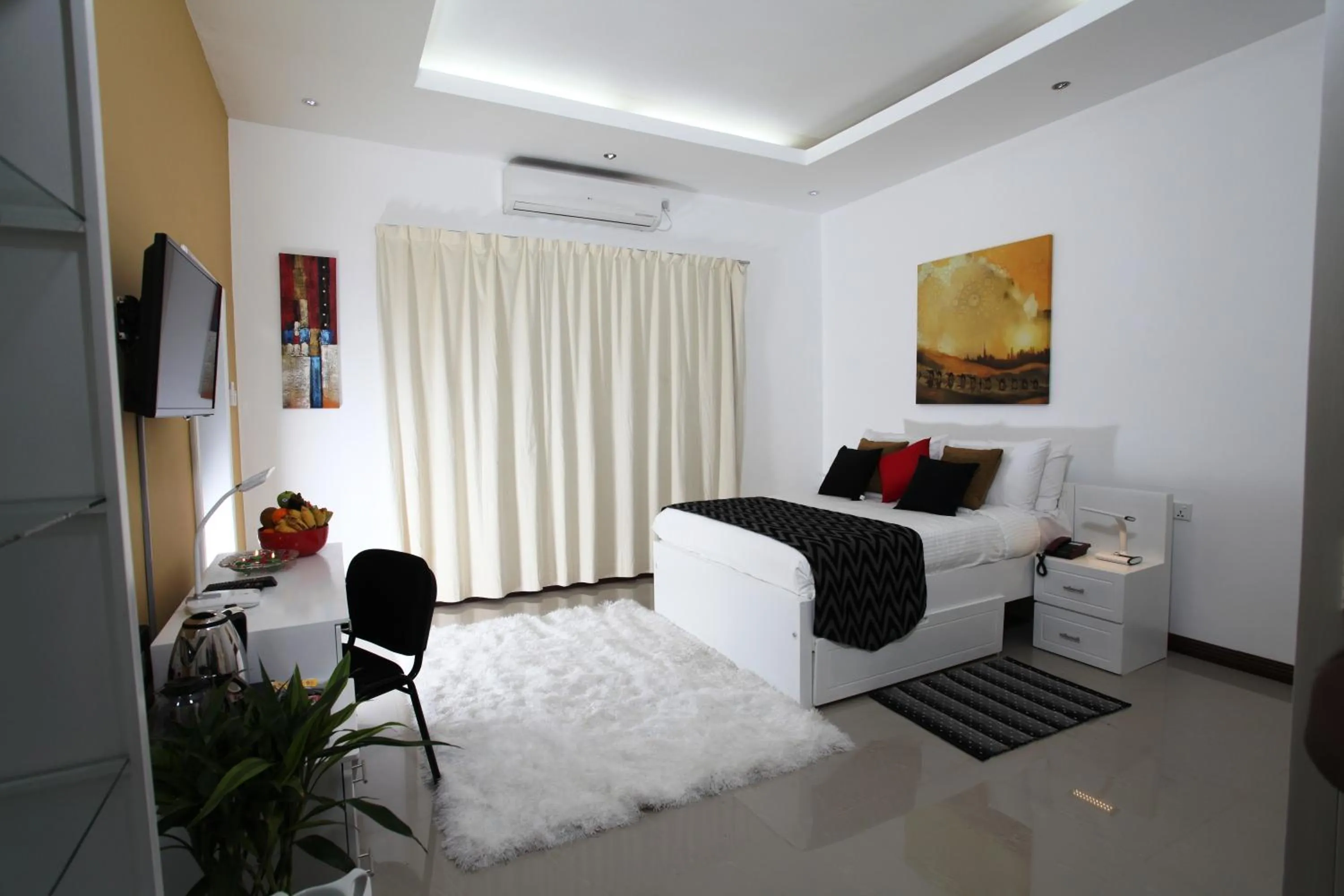 TV and multimedia, Bed in Ayaana Boutique Hotel