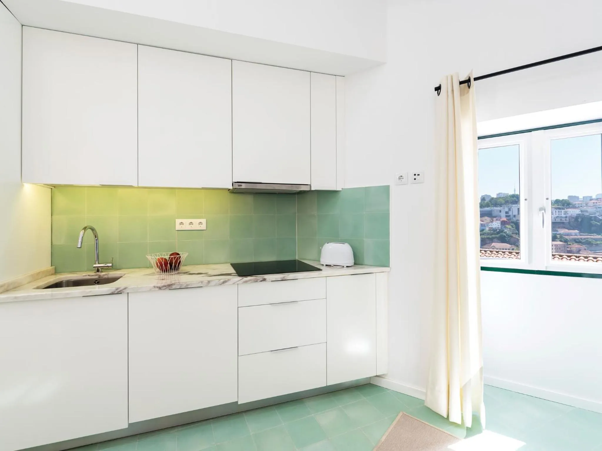 Kitchen or kitchenette in Arco Apartments