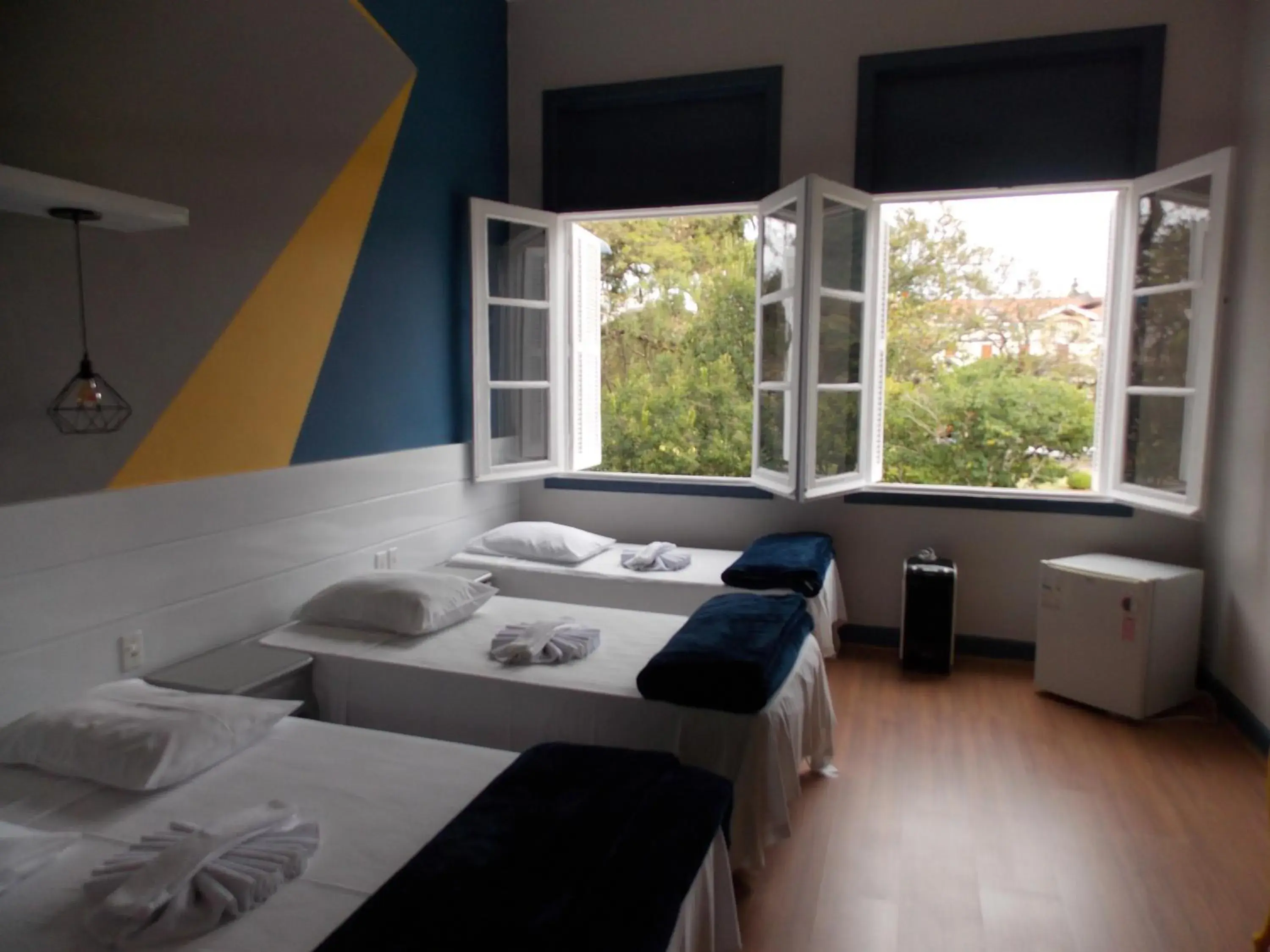 Standard Quadruple Room in MOVA Hotel D'oeste - Localizado em frente a Praça Principal da Cidade, na área Central - Pé na Praça Standard Quadruple Room in MOVA Hotel D'oeste - Localizado em frente a Praça Principal da Cidade, na área Central - Pé na Praça