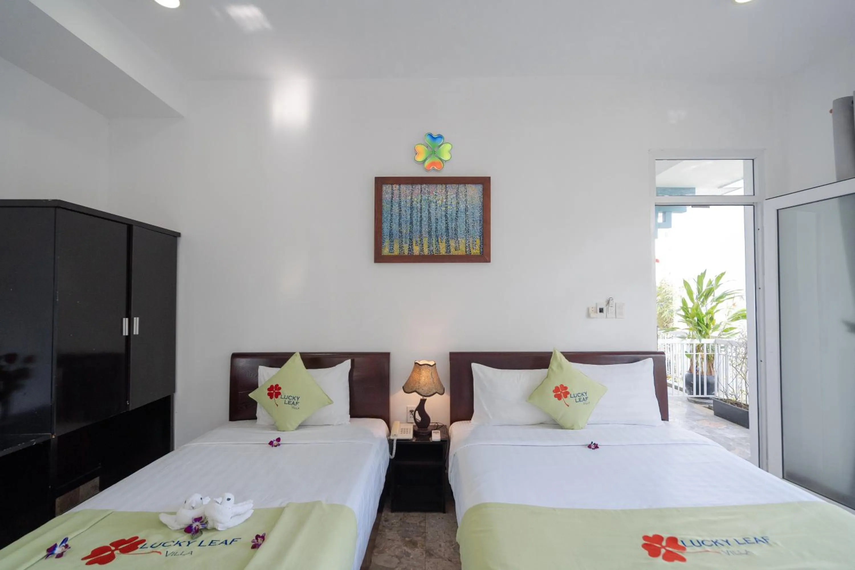 Bed in Lucky Leaf Hoian Villa