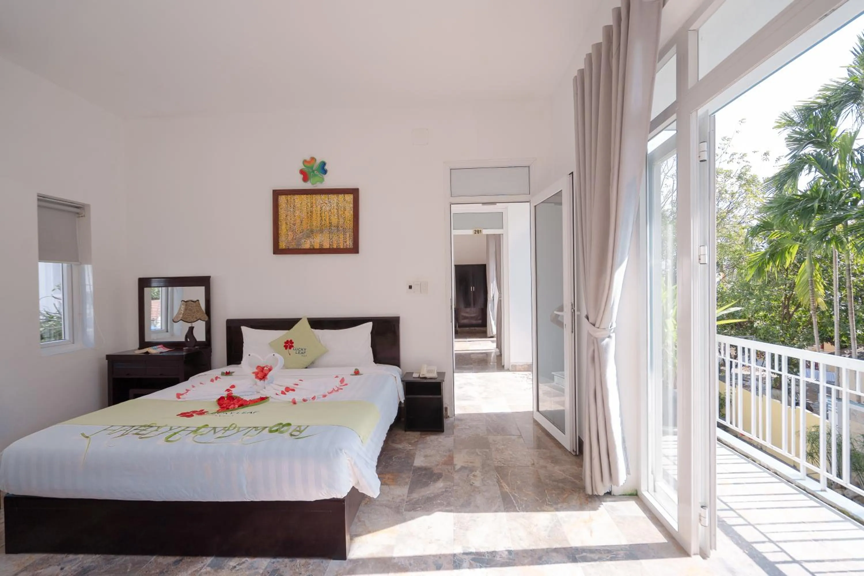 Bed in Lucky Leaf Hoian Villa