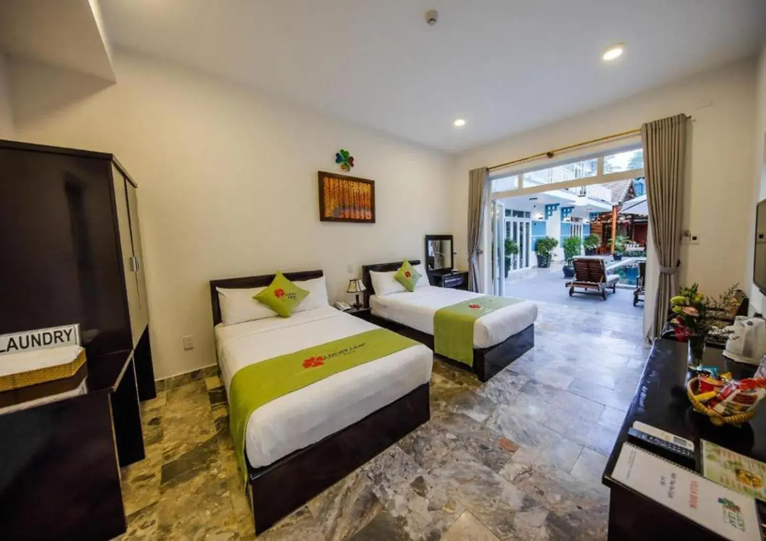 Bed in Lucky Leaf Hoian Villa Bed in Lucky Leaf Hoian Villa