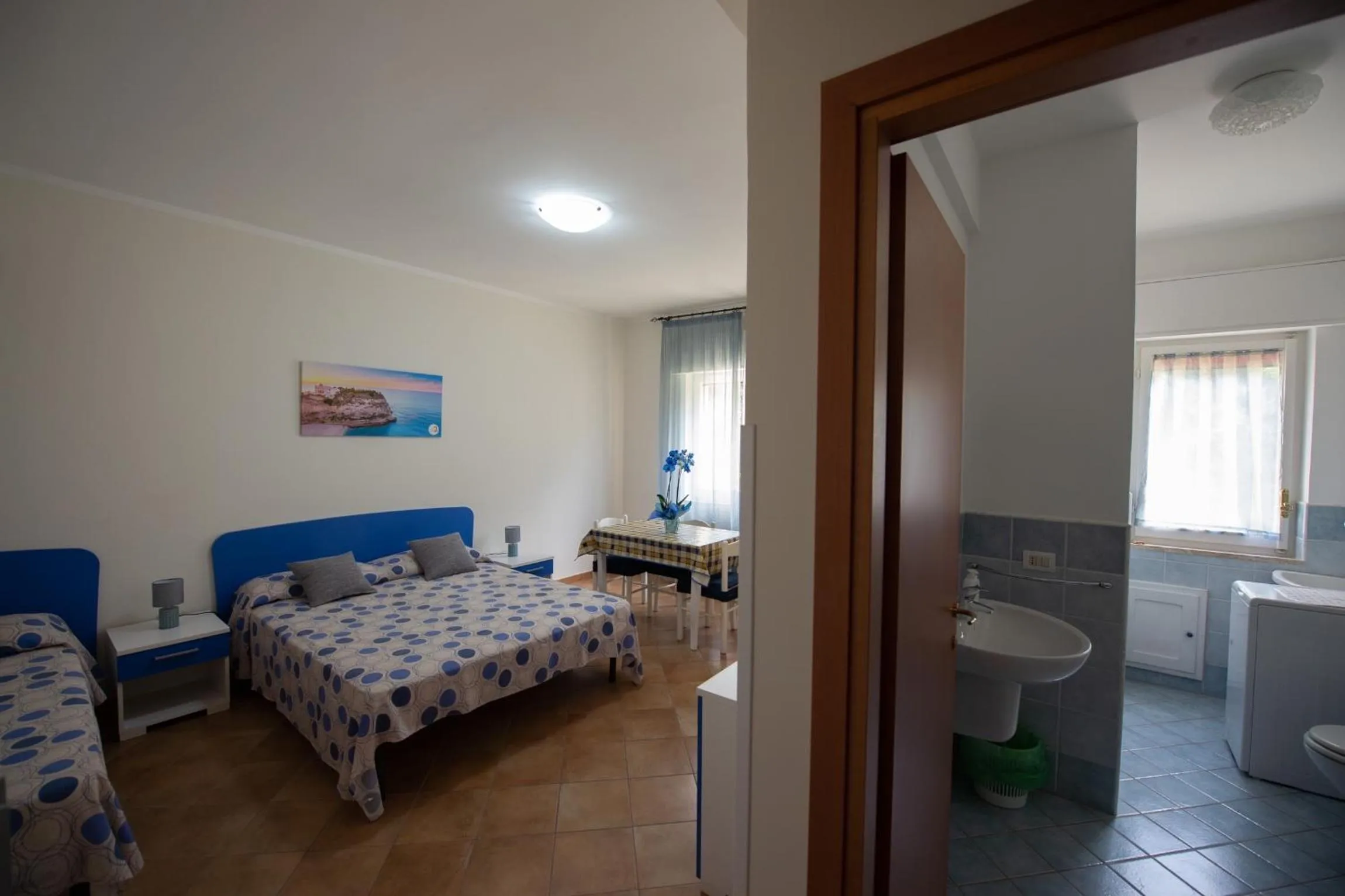 Toilet, Bed in Appartamenti Attilio