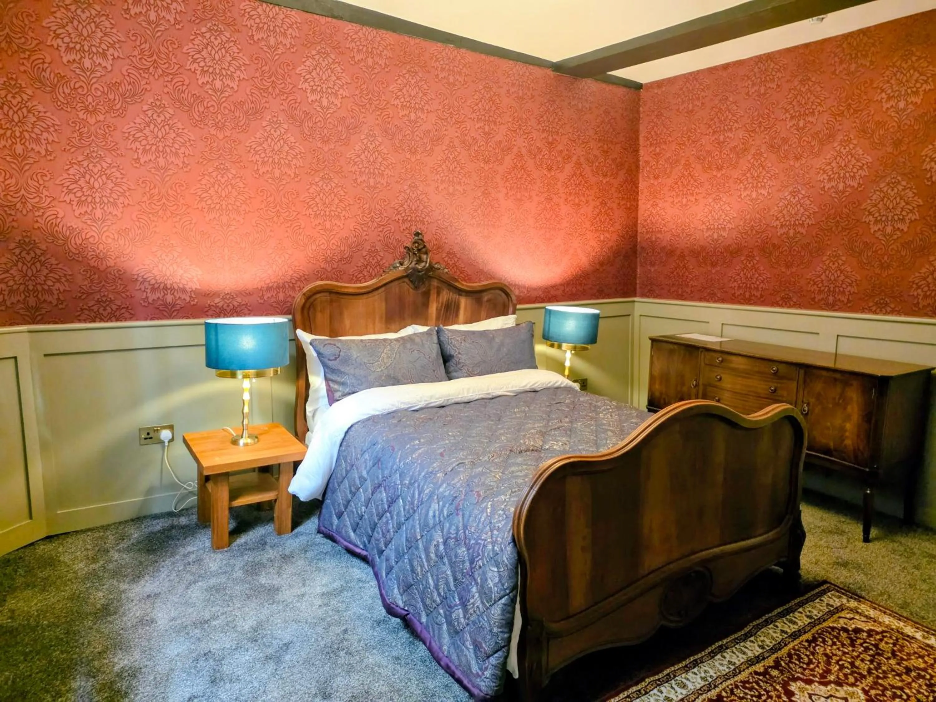 Bed in The New Inn by Roomsbooked