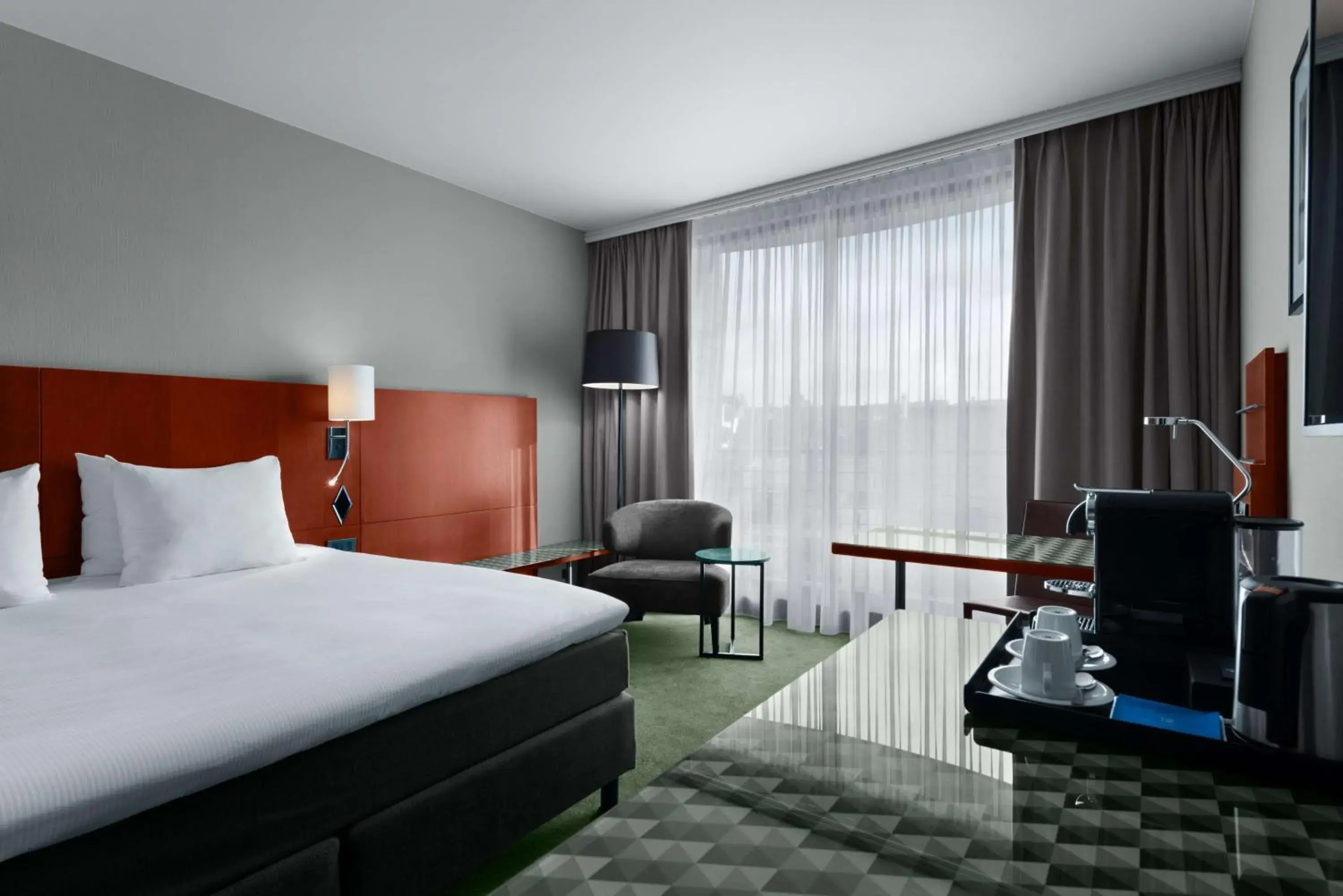 Photo of the whole room, Bed in NH Brussels EU Berlaymont Photo of the whole room, Bed in NH Brussels EU Berlaymont