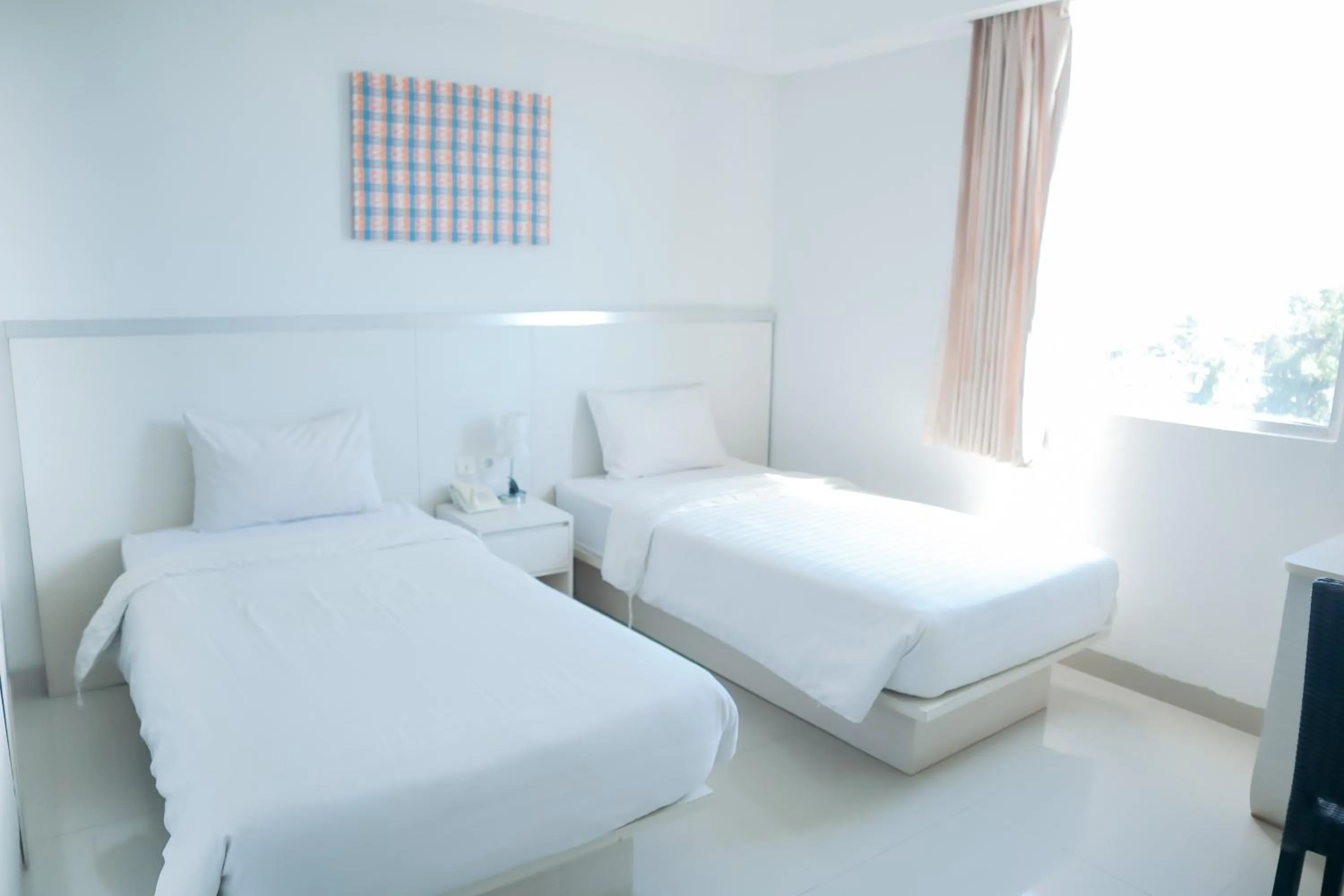 Bed in Liberta Hotel Grand Sayang Makassar