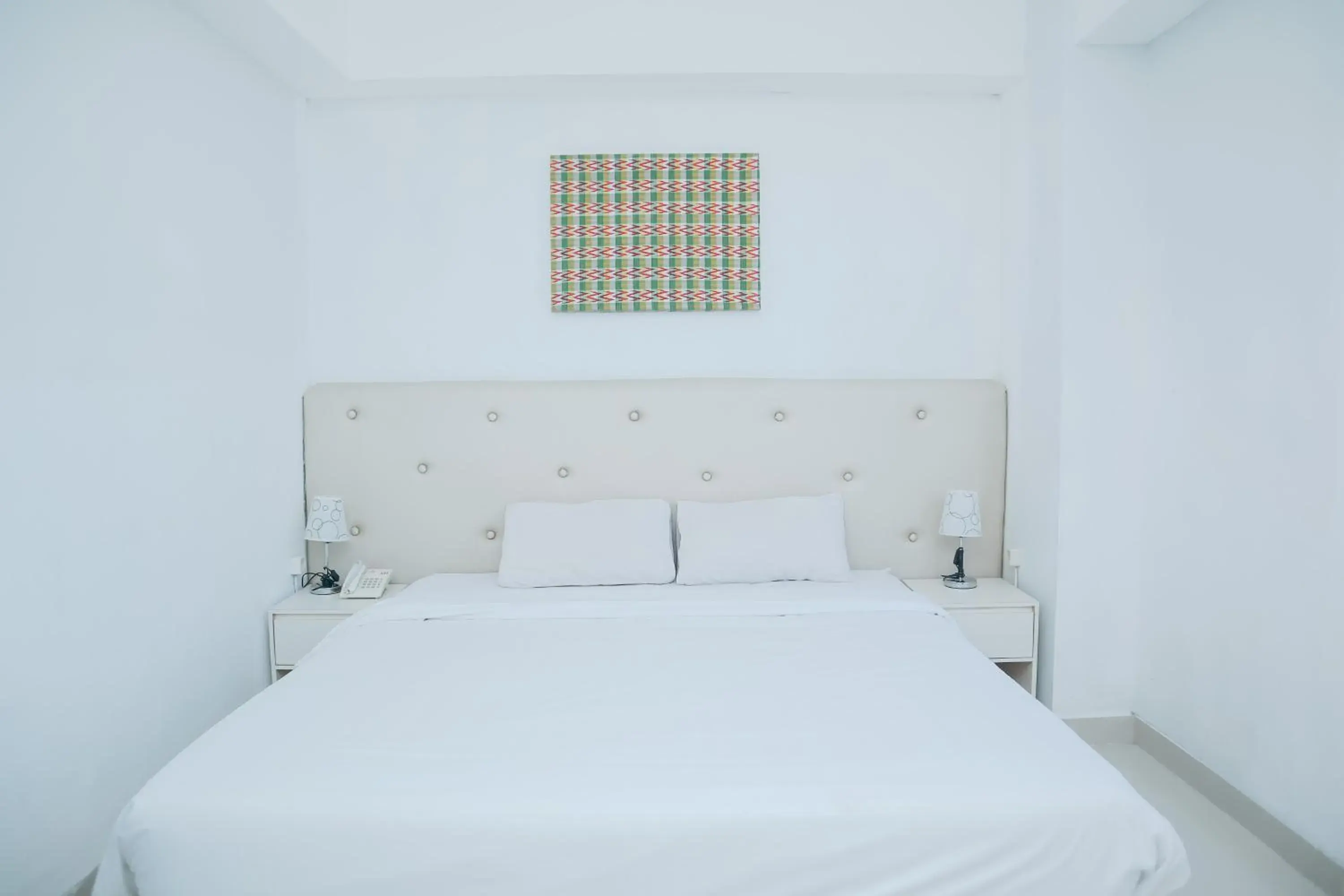 Bed in Liberta Hotel Grand Sayang Makassar Bed in Liberta Hotel Grand Sayang Makassar