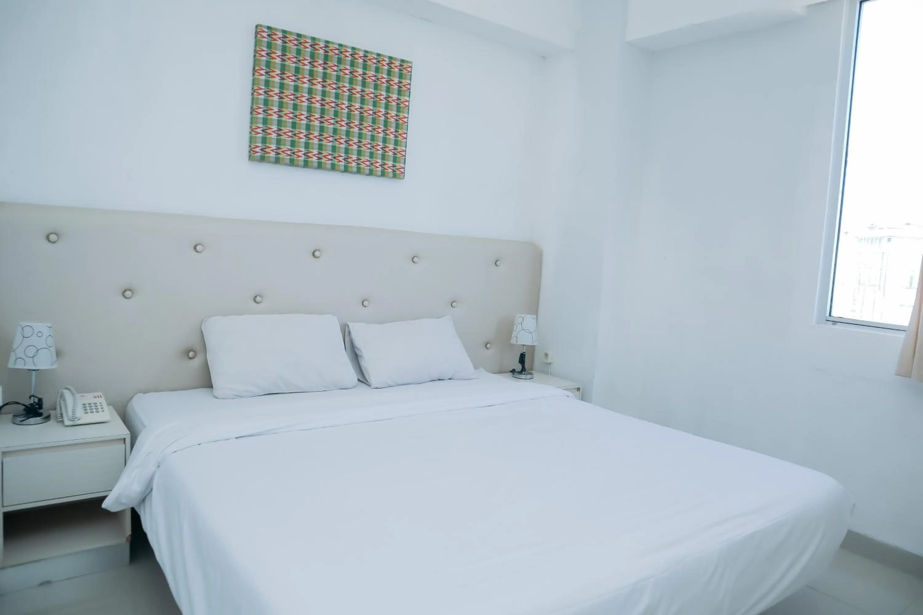 View (from property/room), Bed in Liberta Hotel Grand Sayang Makassar