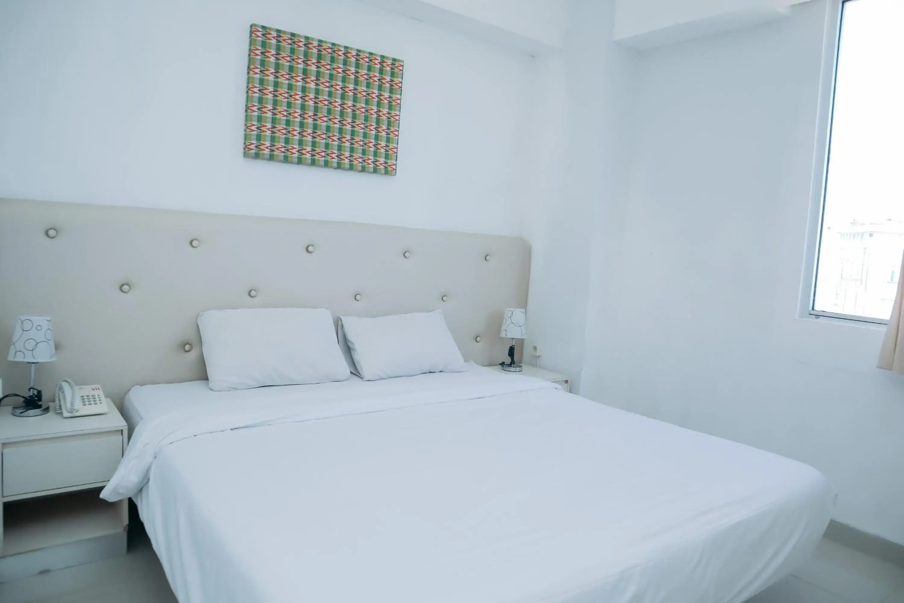 View (from property/room), Bed in Liberta Hotel Grand Sayang Makassar View (from property/room), Bed in Liberta Hotel Grand Sayang Makassar