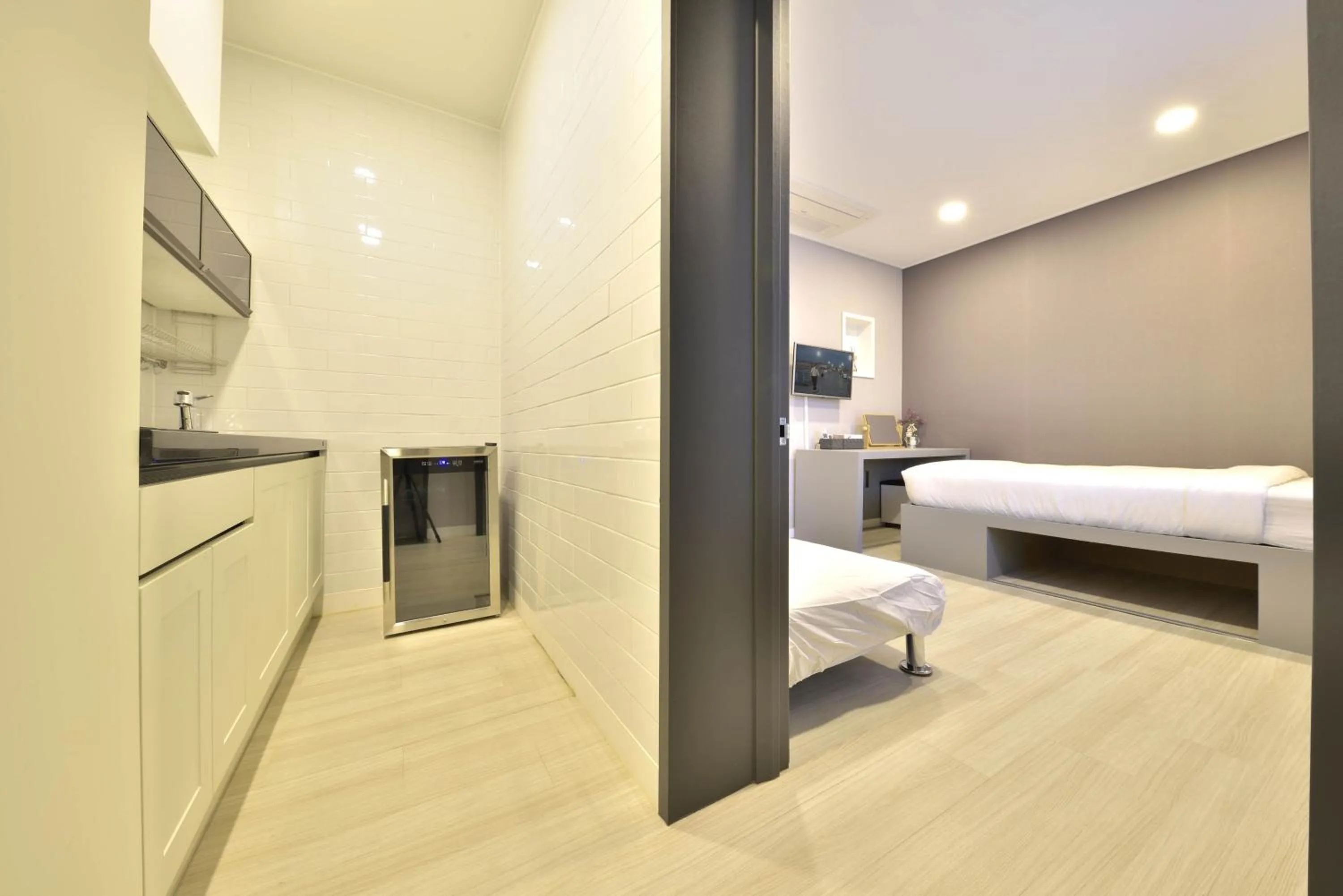 Kitchen or kitchenette, Bed in With U Hotel & Guesthouse