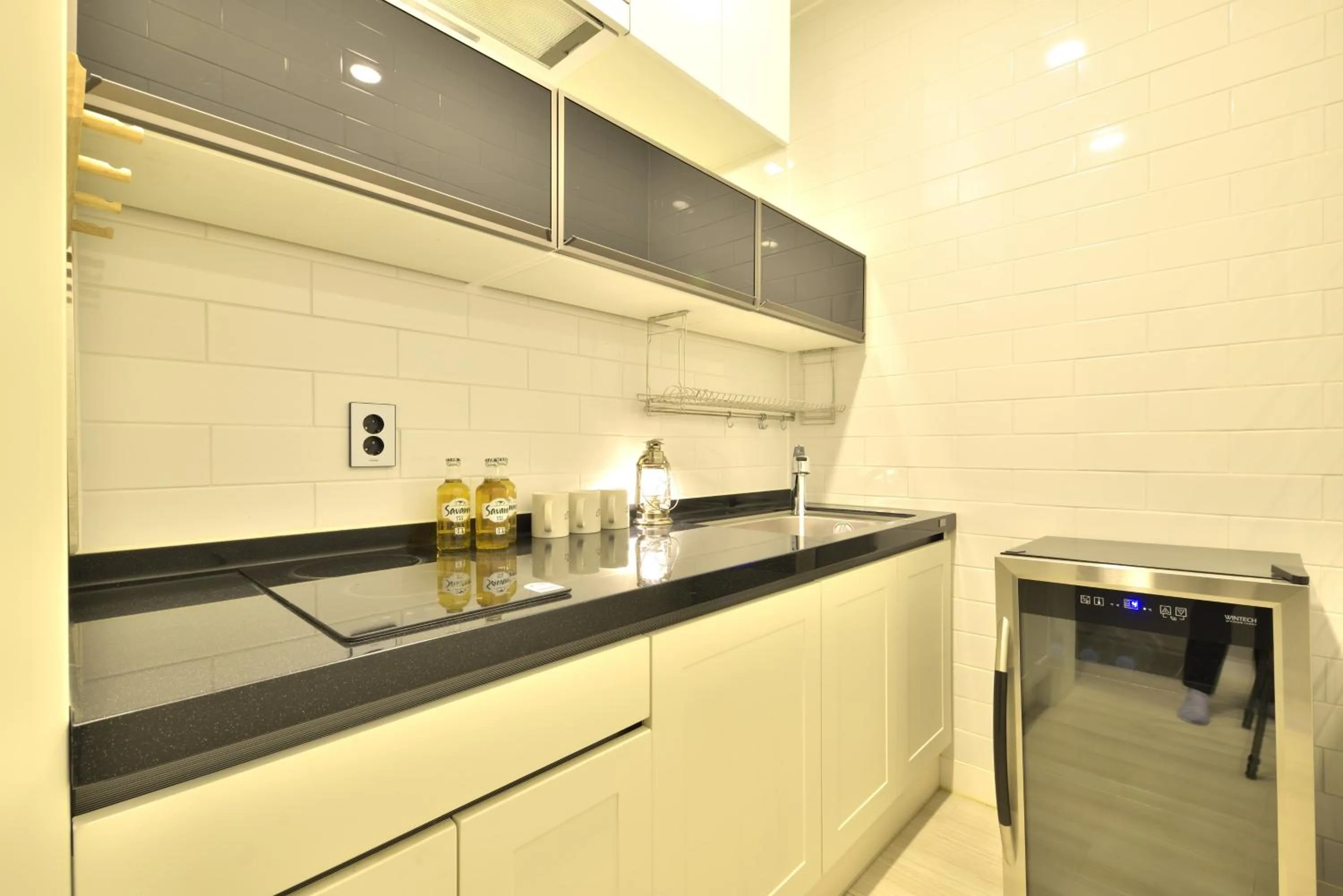 Kitchen or kitchenette in With U Hotel & Guesthouse