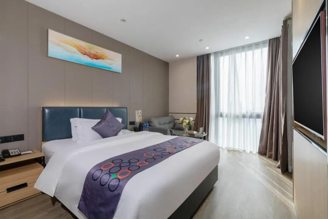 Bed in Yimi MIX International Apartment