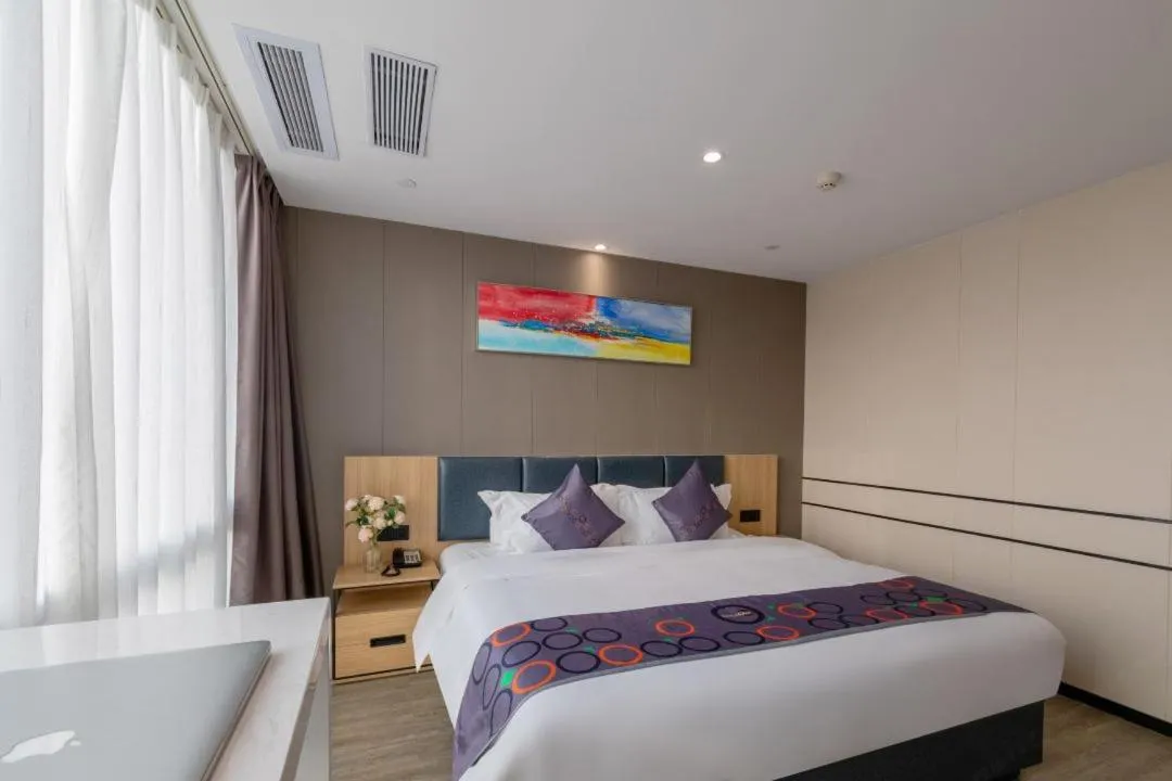 Bed in Yimi MIX International Apartment