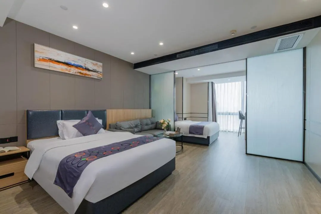 Bed in Yimi MIX International Apartment
