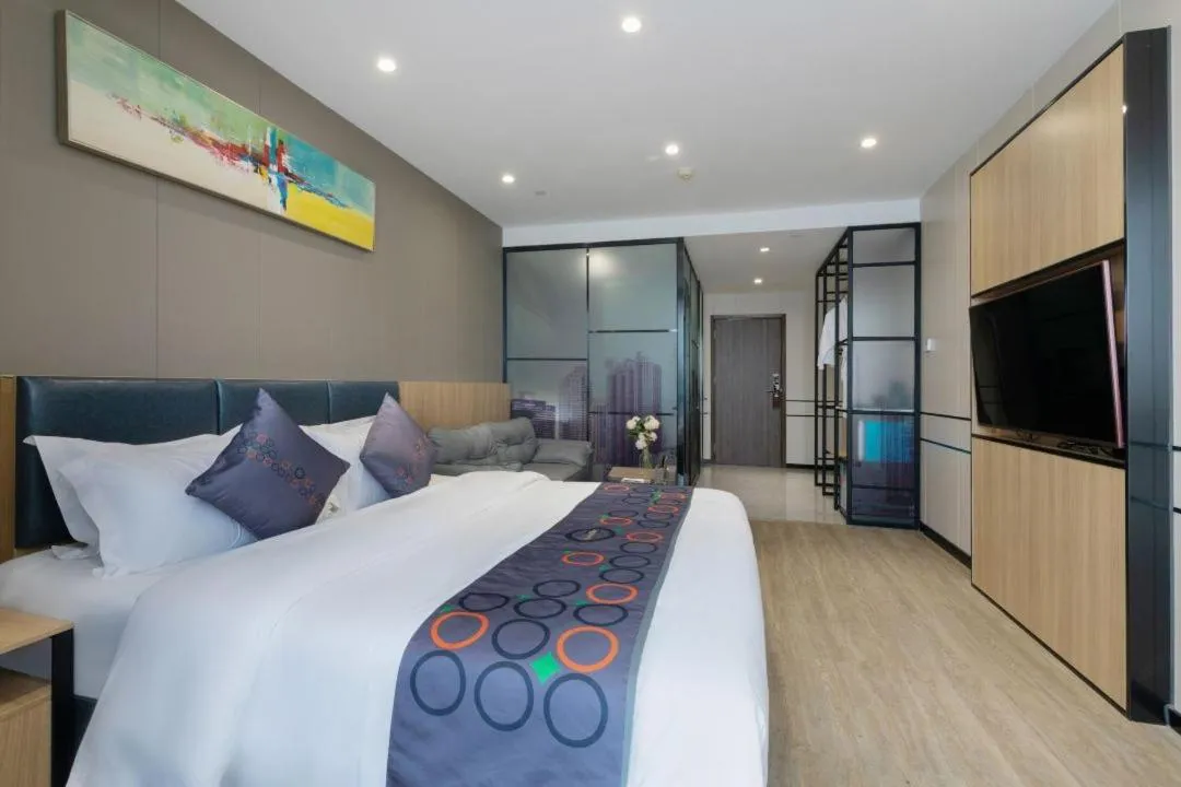 Bed in Yimi MIX International Apartment