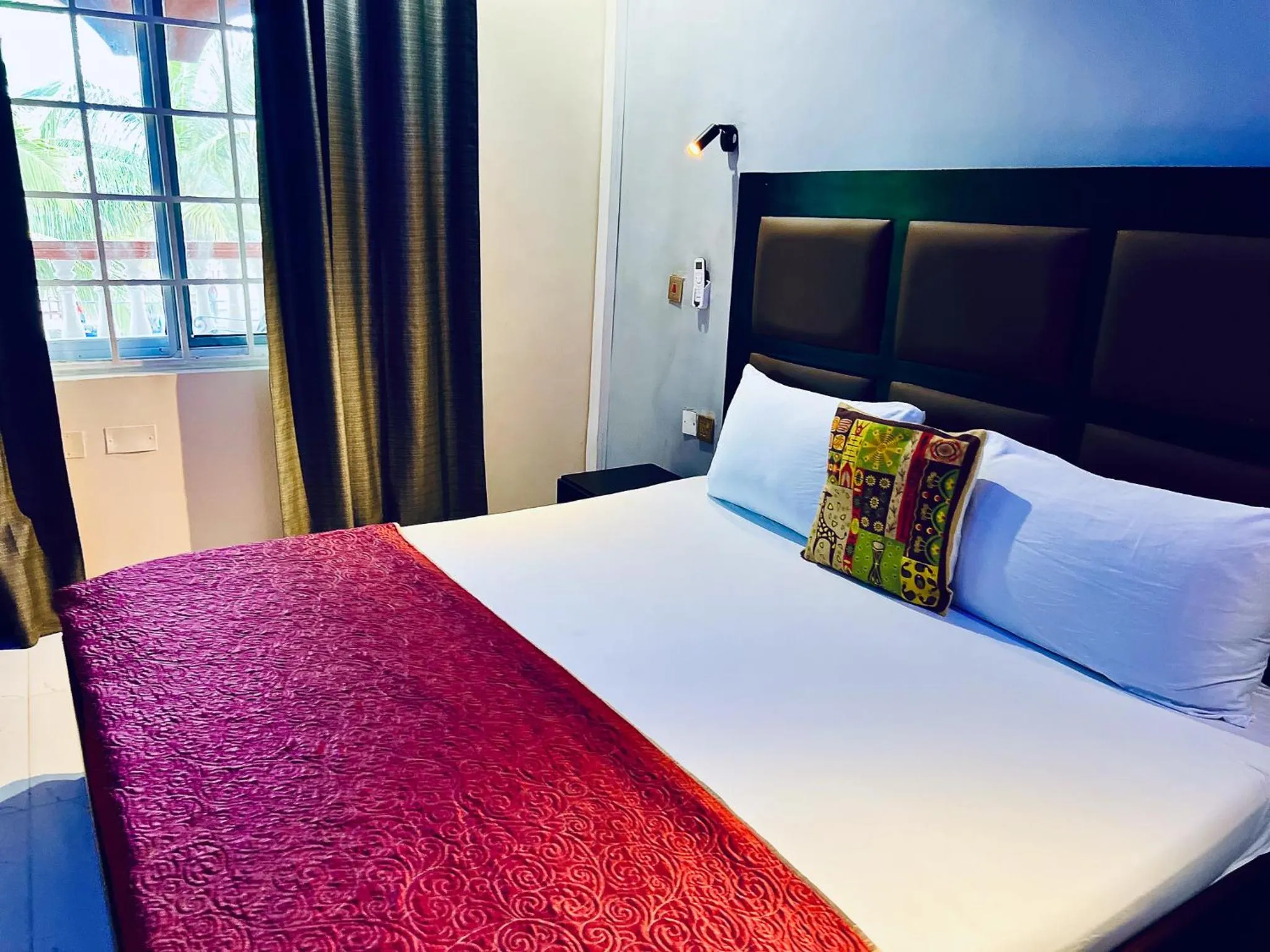 Bed in Coconut Pointe Villa & Beach Resort