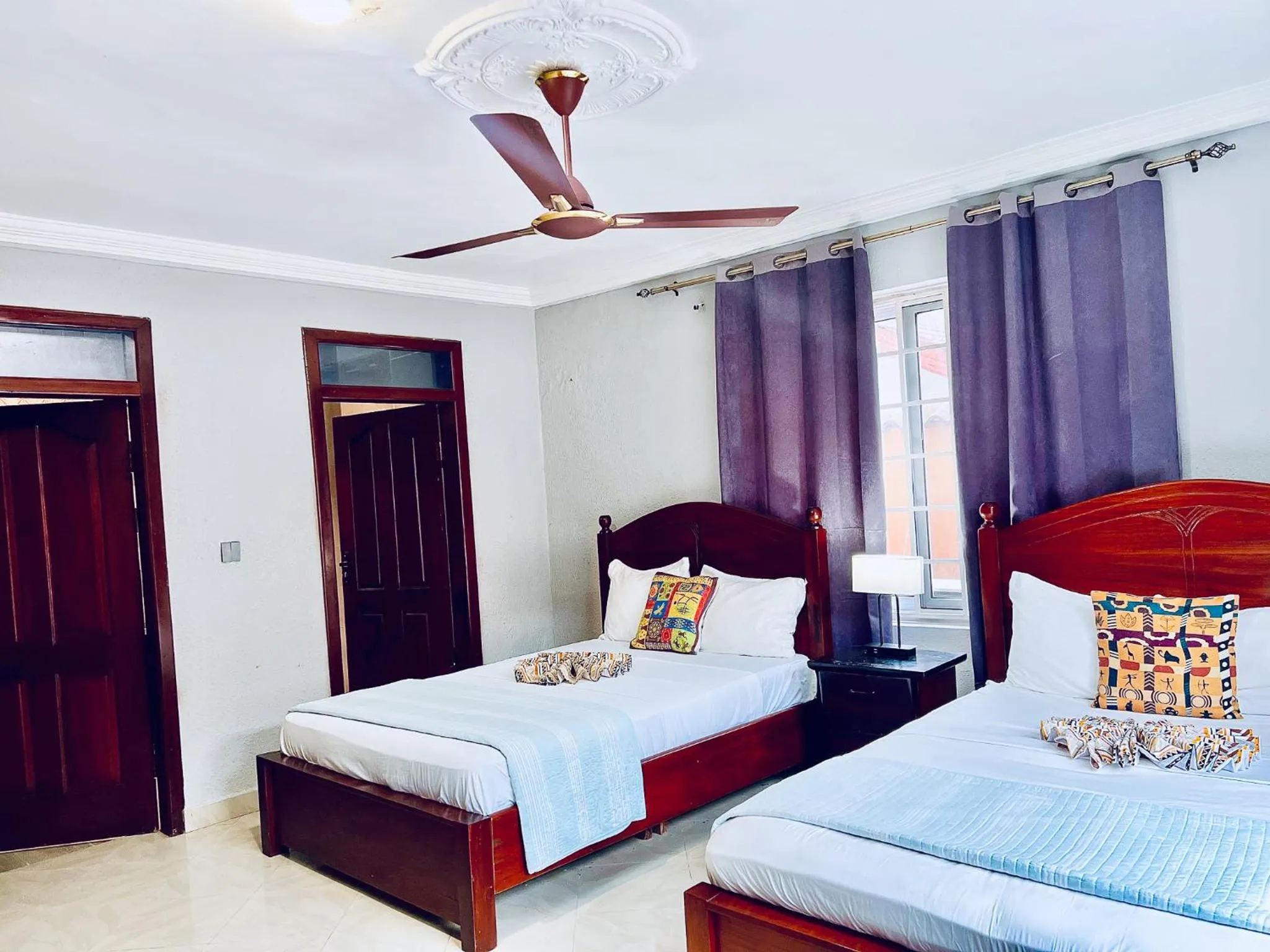 Bed in Coconut Pointe Villa & Beach Resort