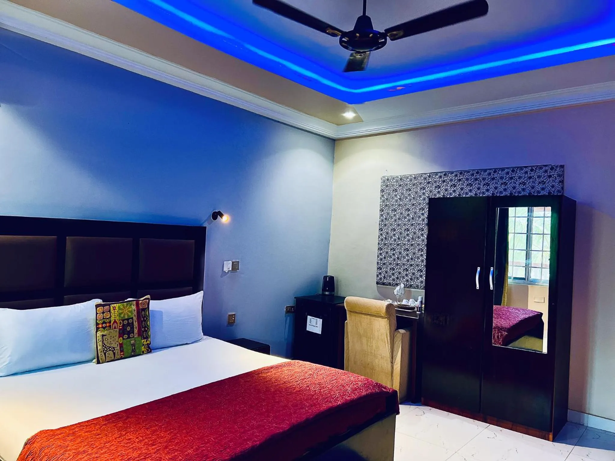 Bed in Coconut Pointe Villa & Beach Resort