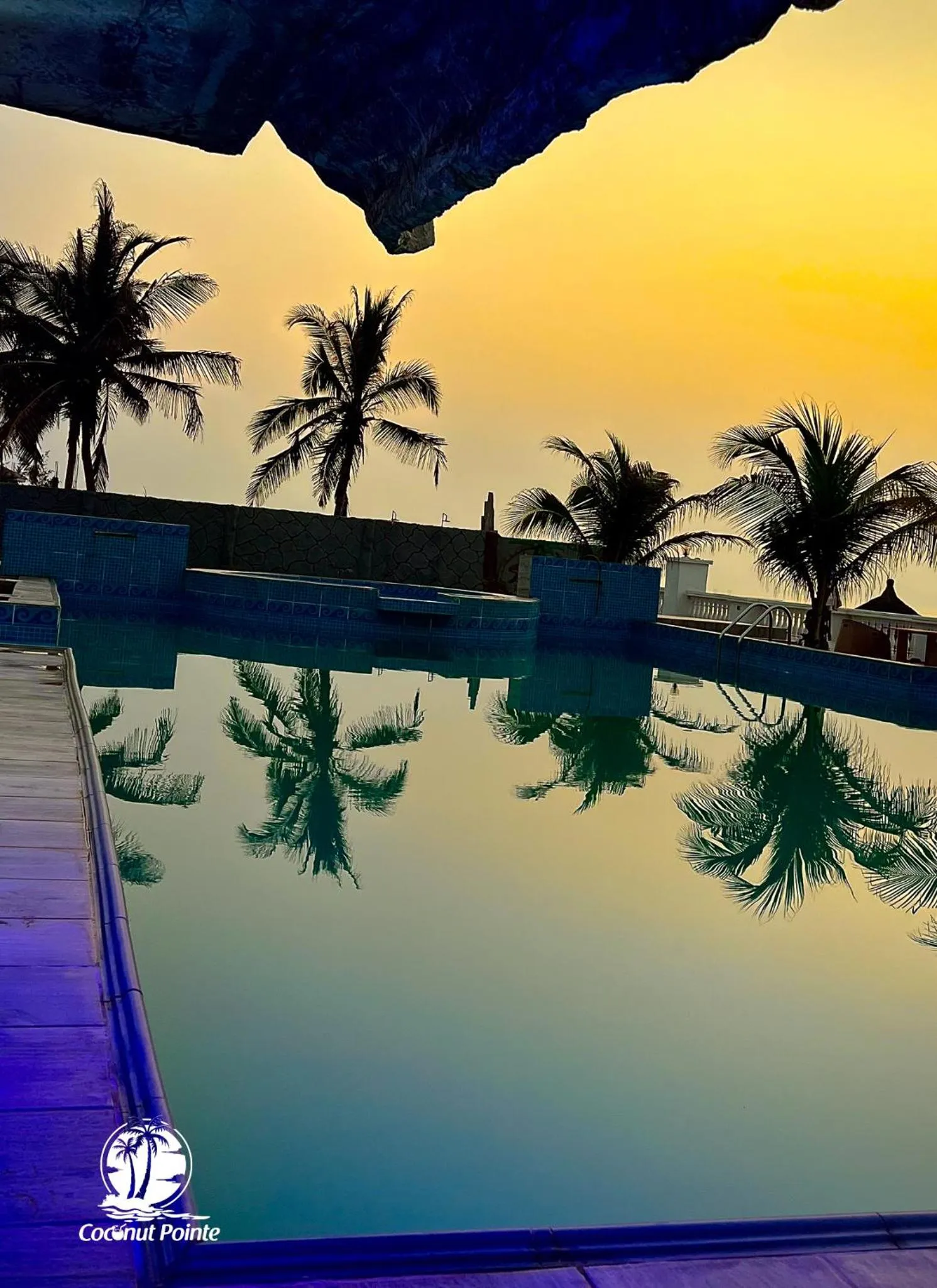 Swimming pool in Coconut Pointe Villa & Beach Resort