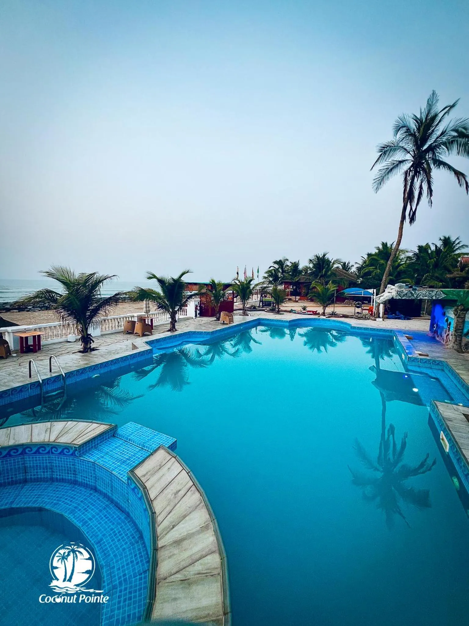 Swimming pool in Coconut Pointe Villa & Beach Resort