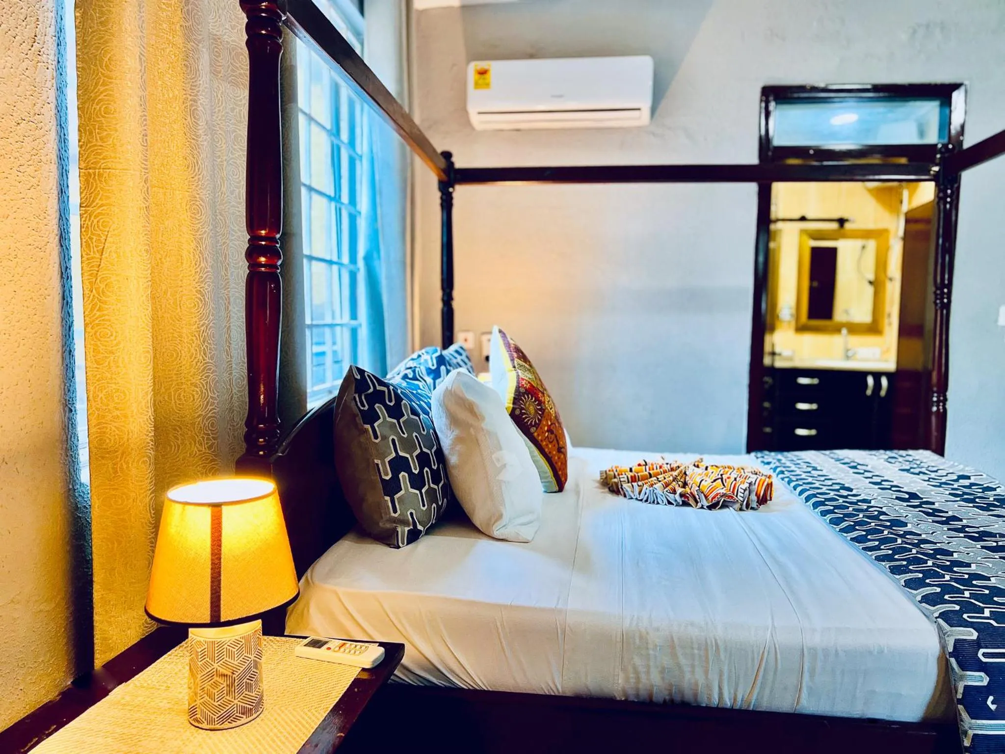 Bed in Coconut Pointe Villa & Beach Resort