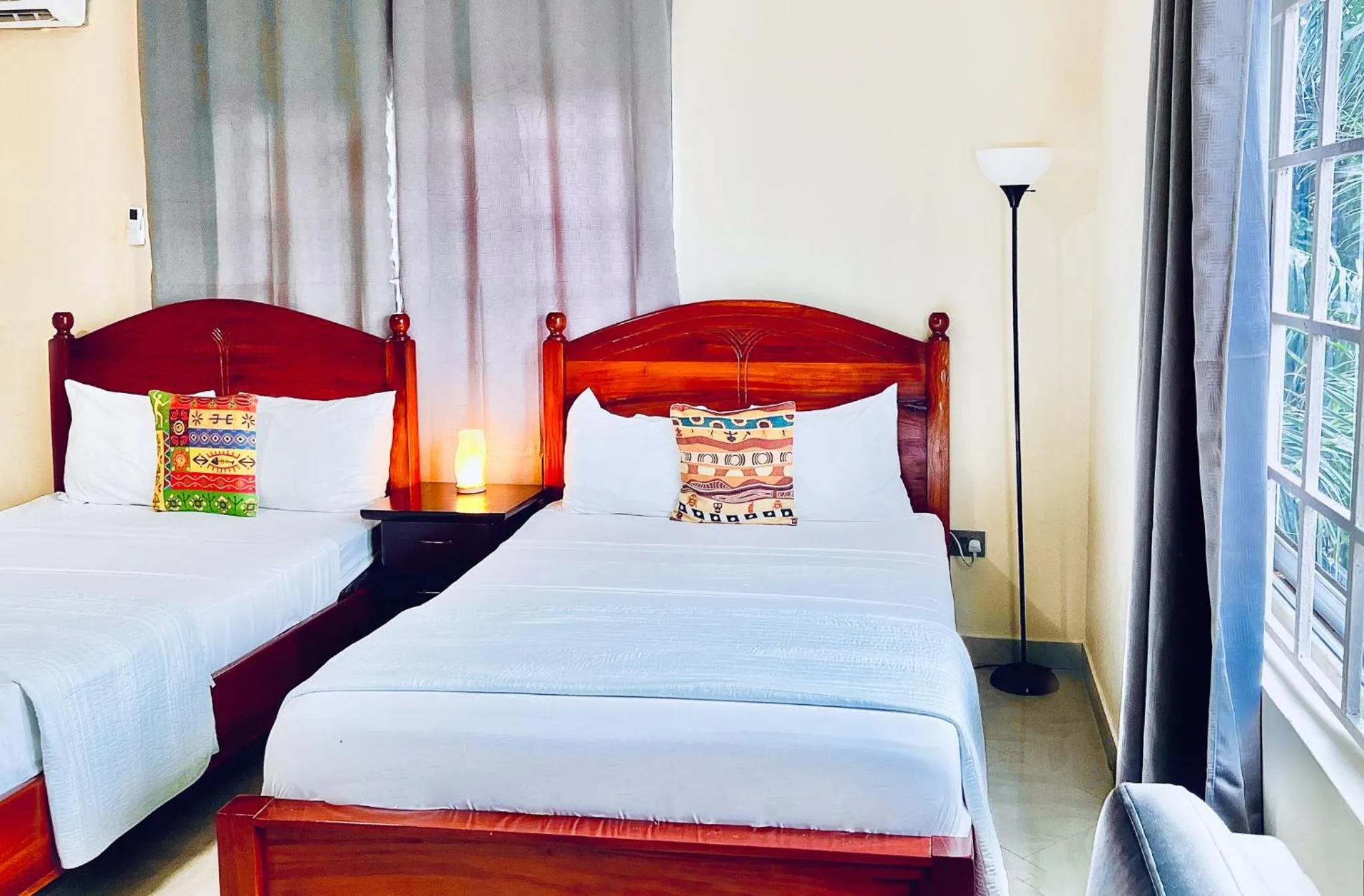 Bed in Coconut Pointe Villa & Beach Resort