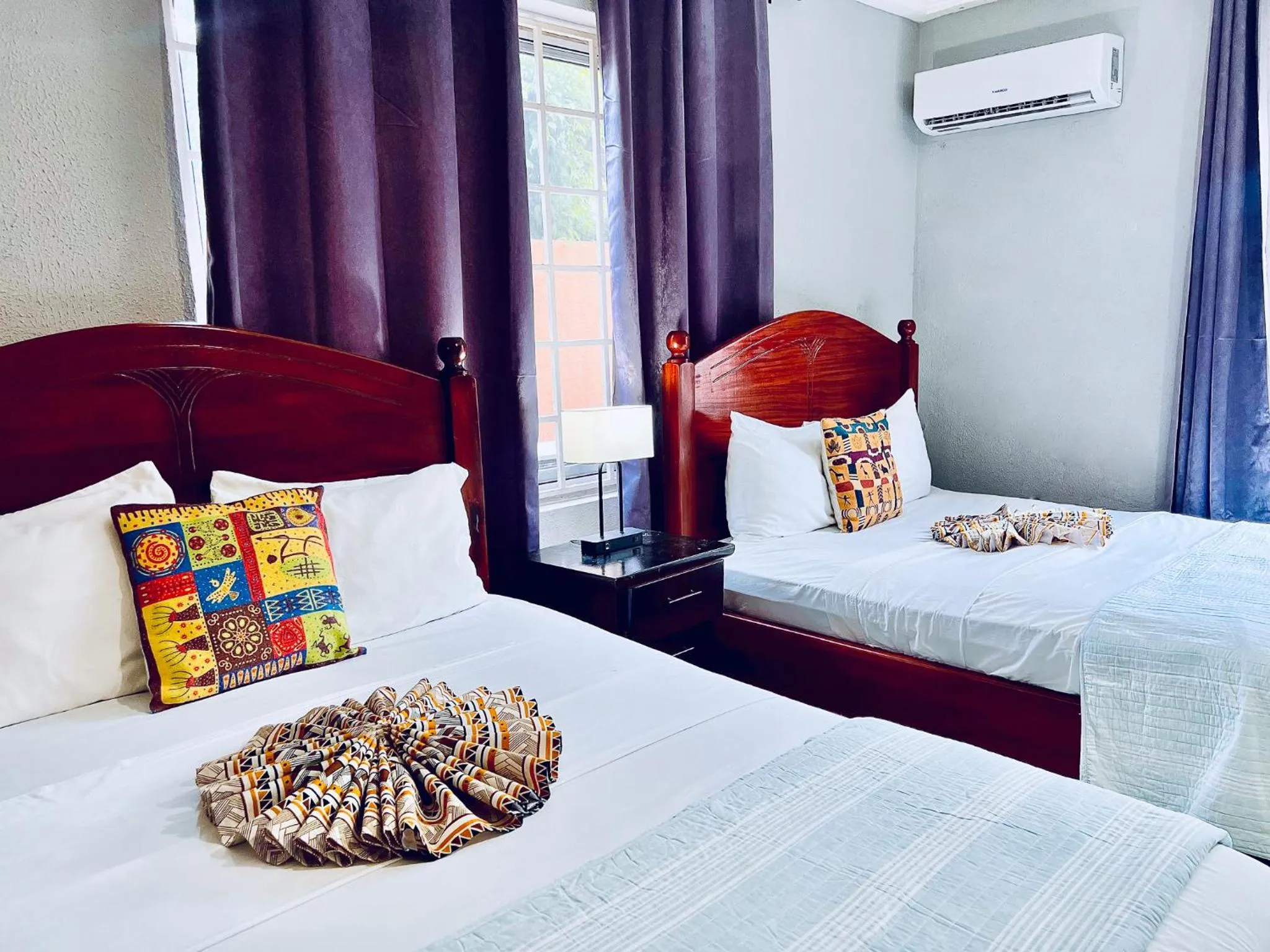 Bed in Coconut Pointe Villa & Beach Resort