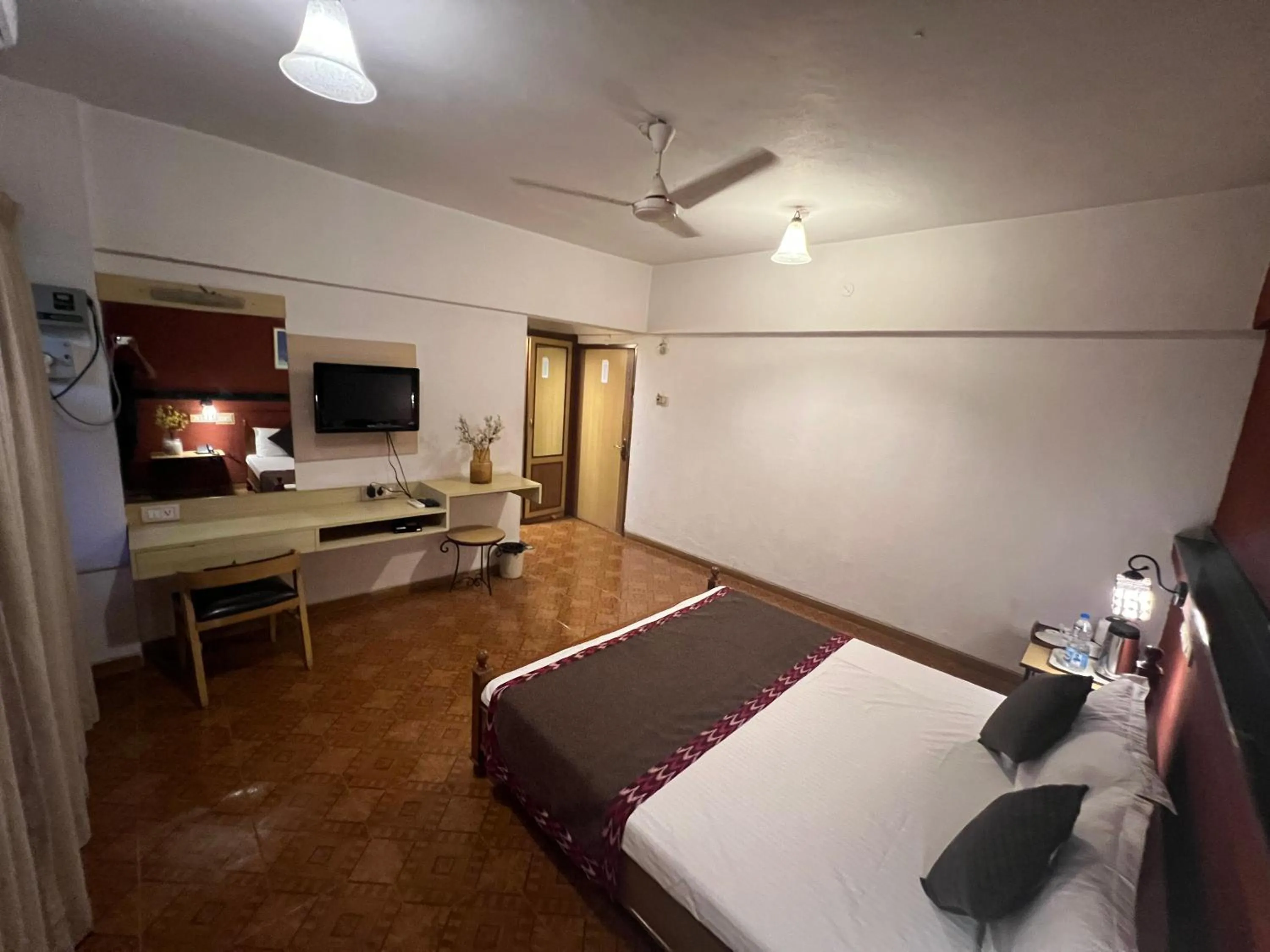 Bed in Konkan Crown Resort & Club