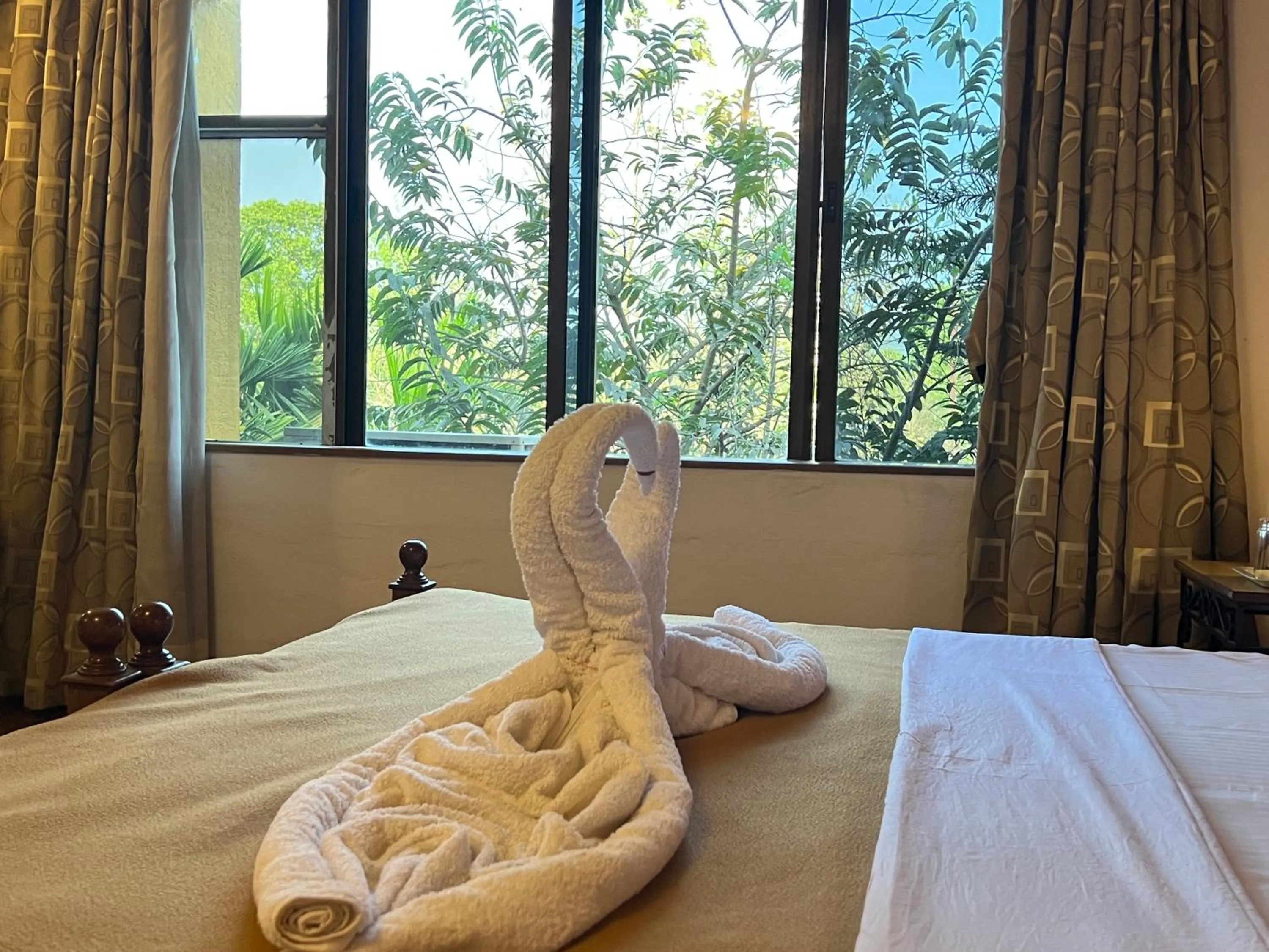 Bed in Konkan Crown Resort & Club