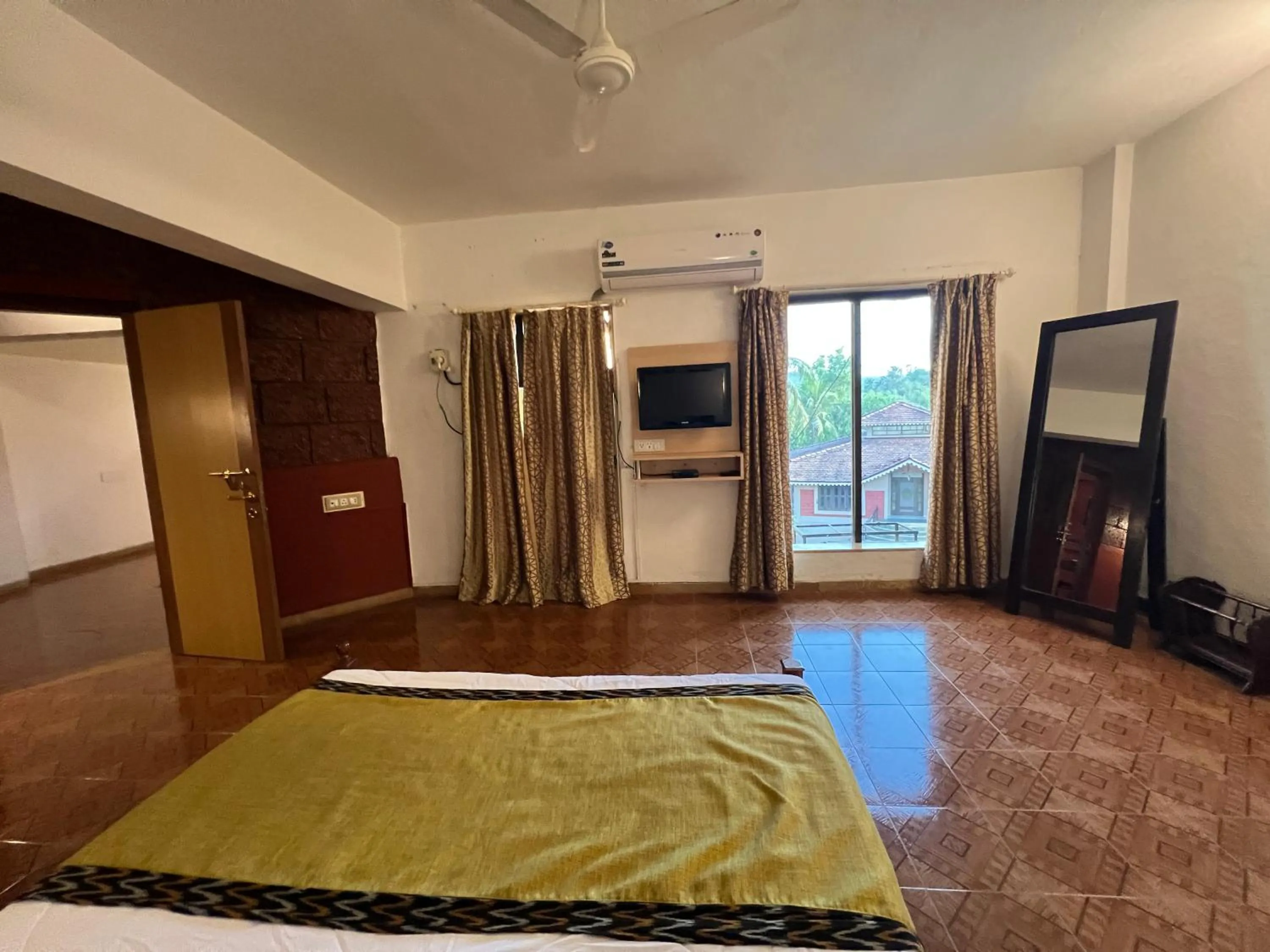 Bed in Konkan Crown Resort & Club