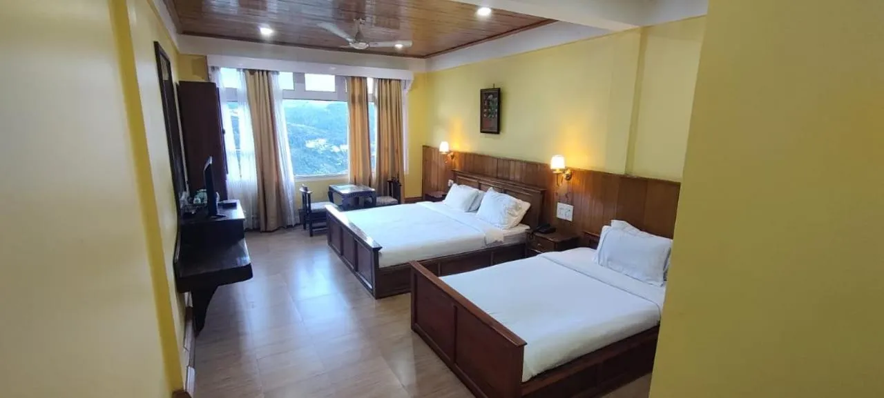 Bed in Pemaling Lords Inn Dirang