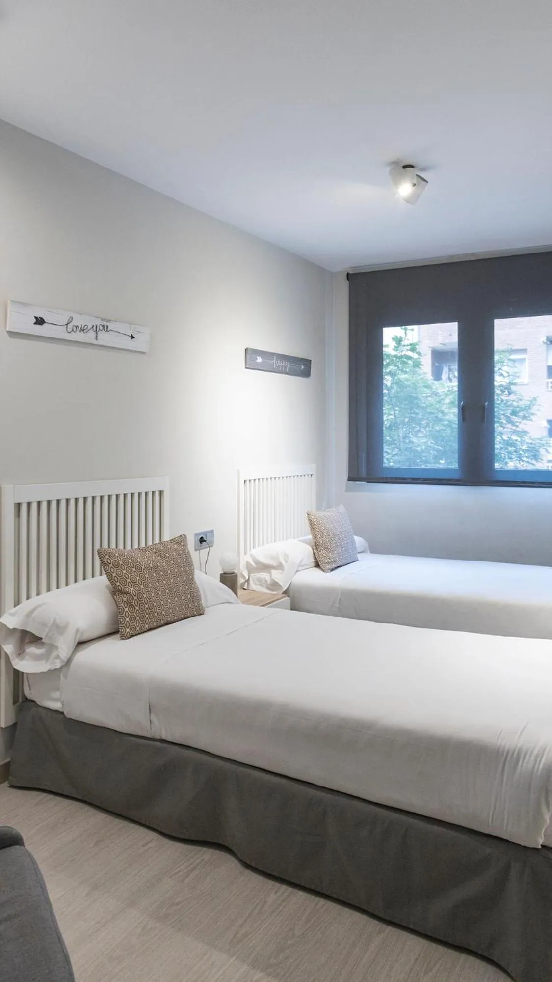 Bed in Apartamentos Real Lleida