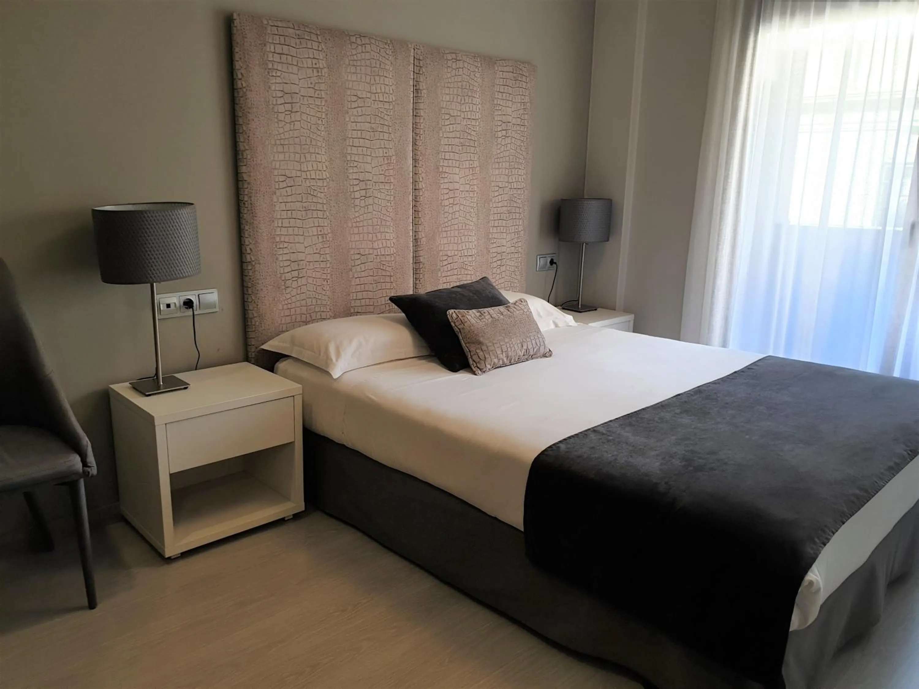 Bedroom, Bed in Apartamentos Real Lleida