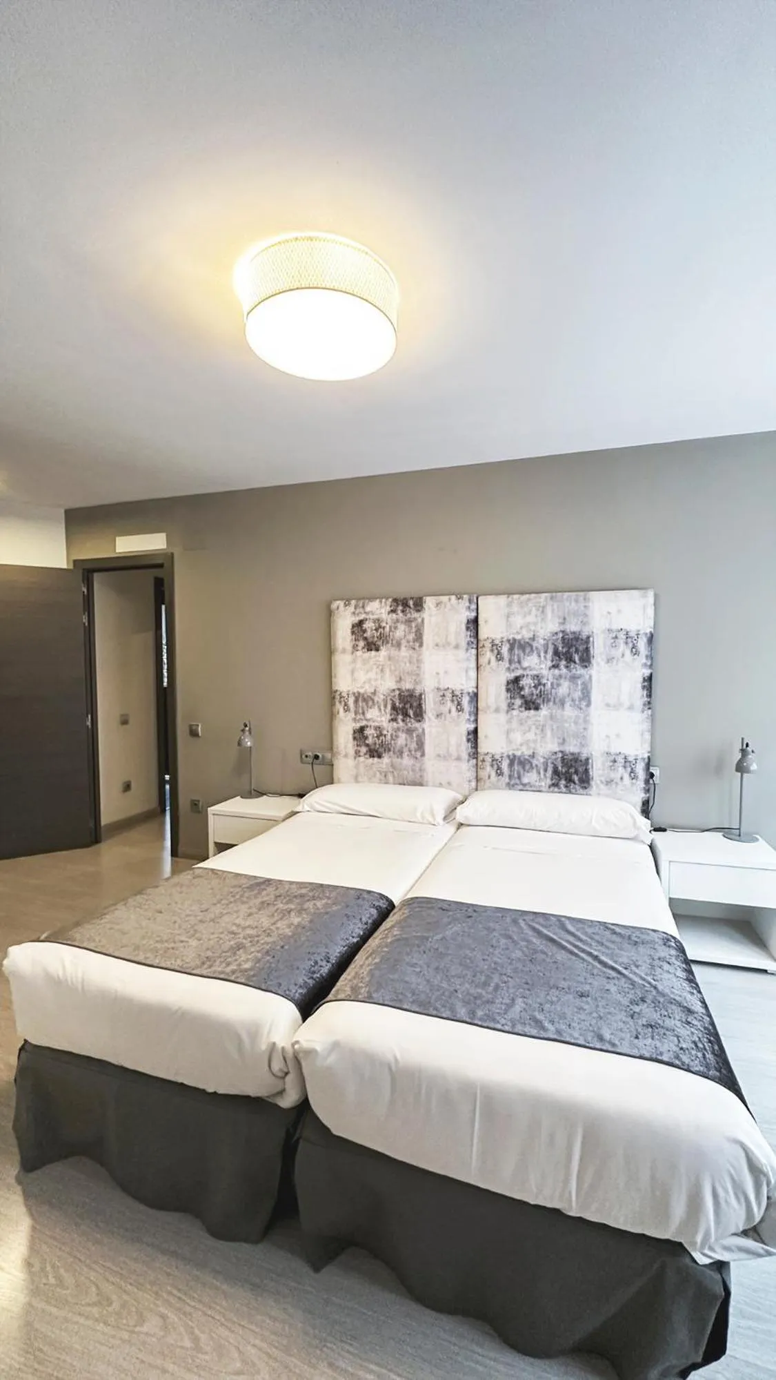 Bed in Apartamentos Real Lleida