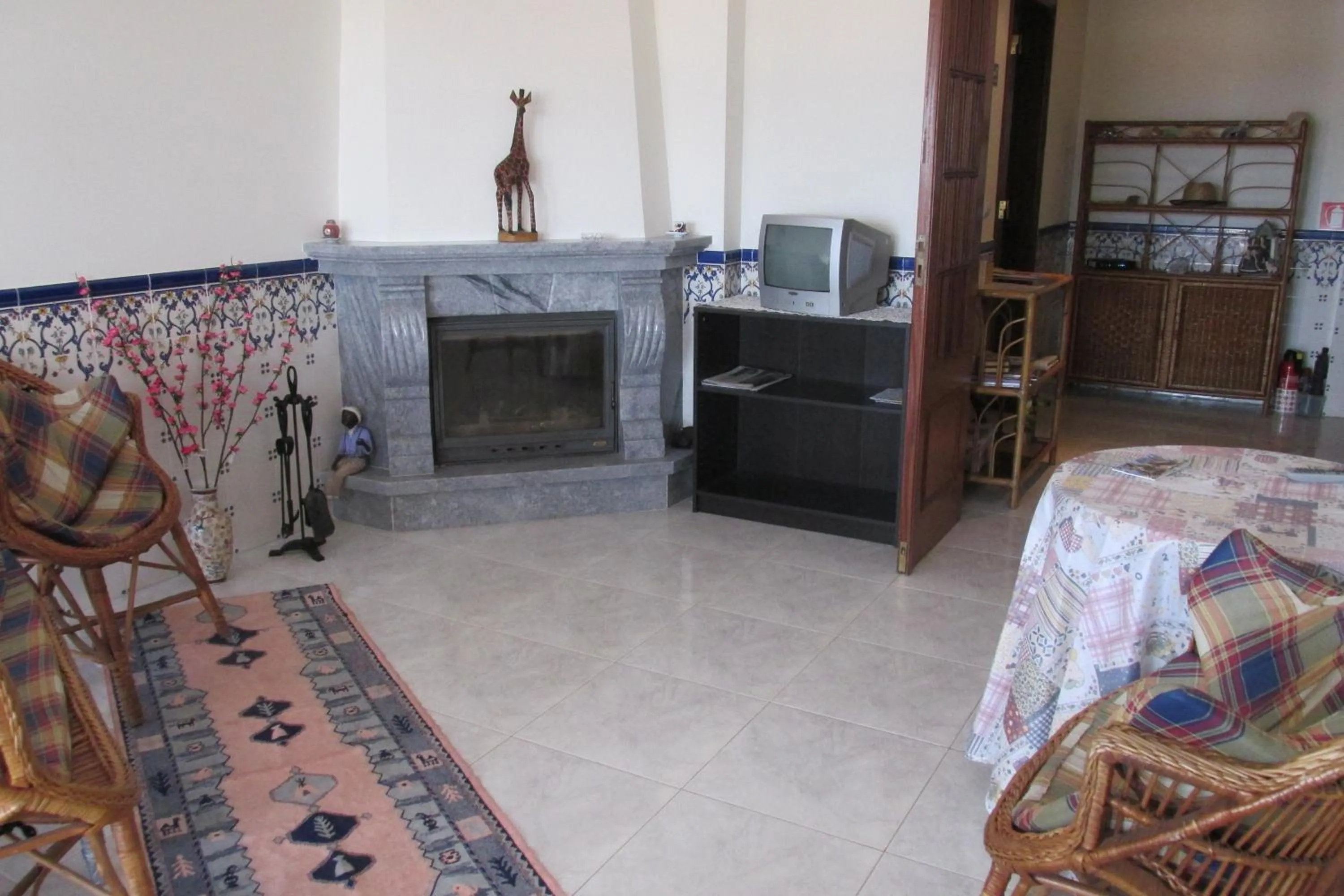 Communal lounge/ TV room in Homestay Marialva Park