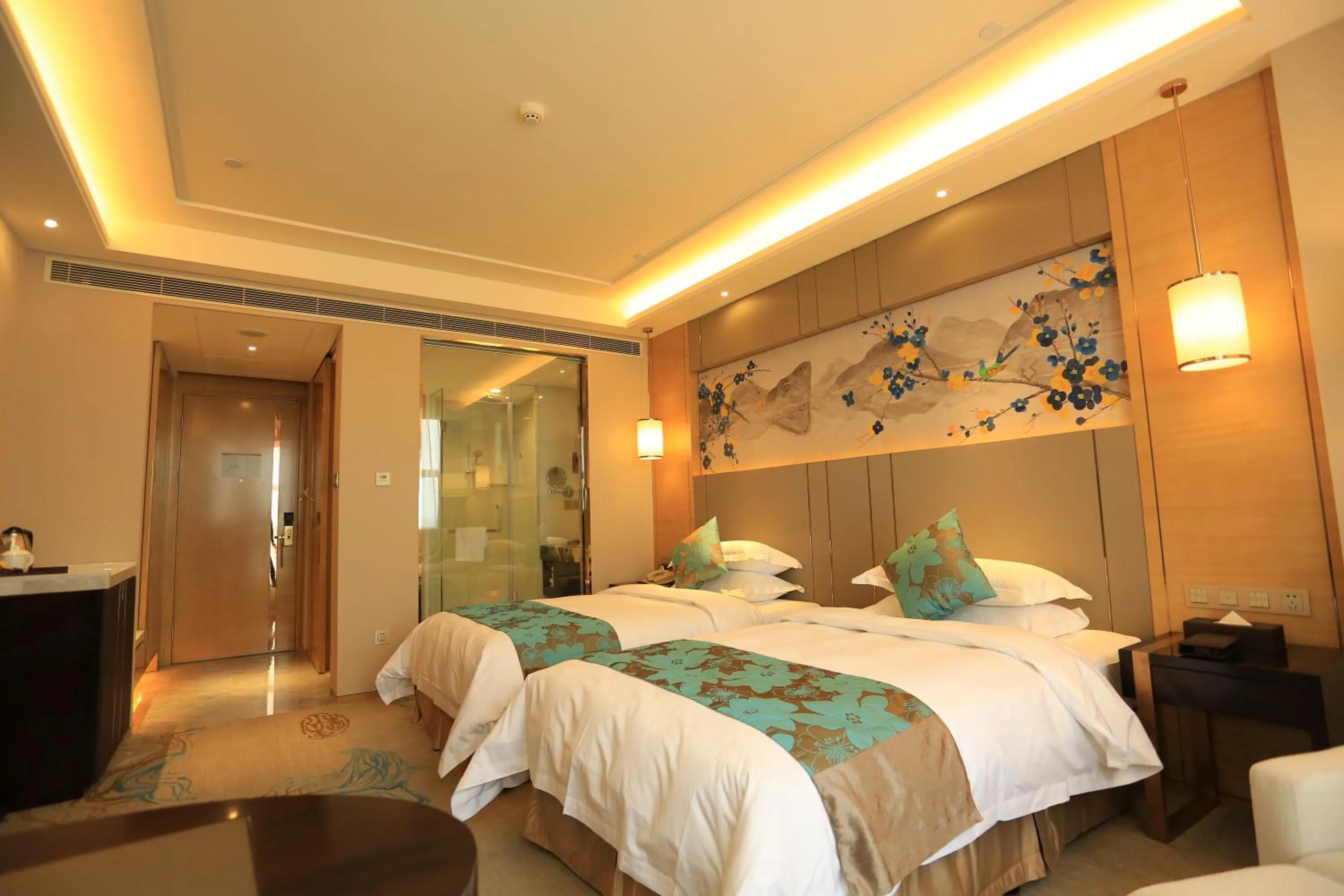 Bed in Ramada Yiyang Taojiang