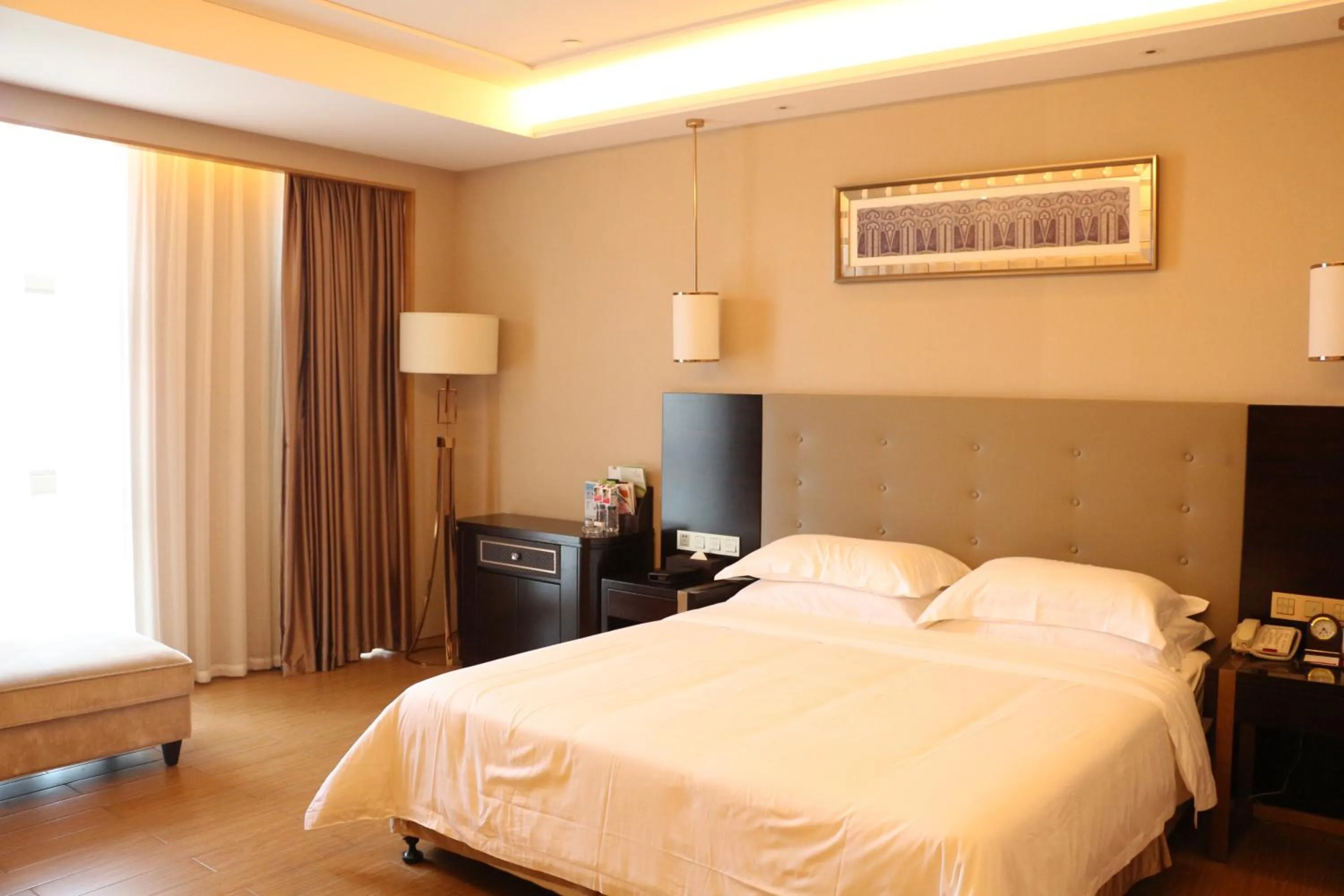 Bed in Ramada Yiyang Taojiang