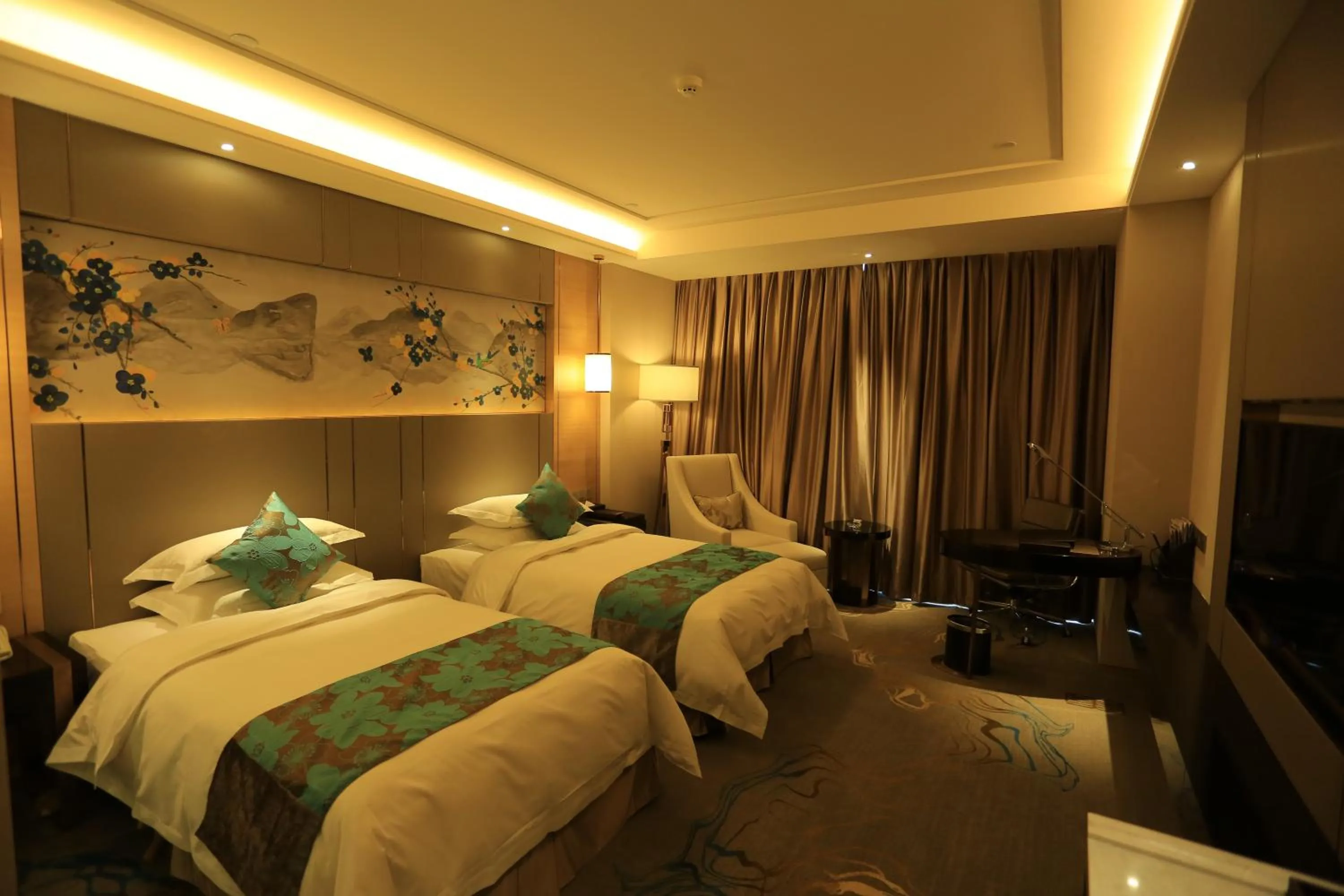 Bed in Ramada Yiyang Taojiang