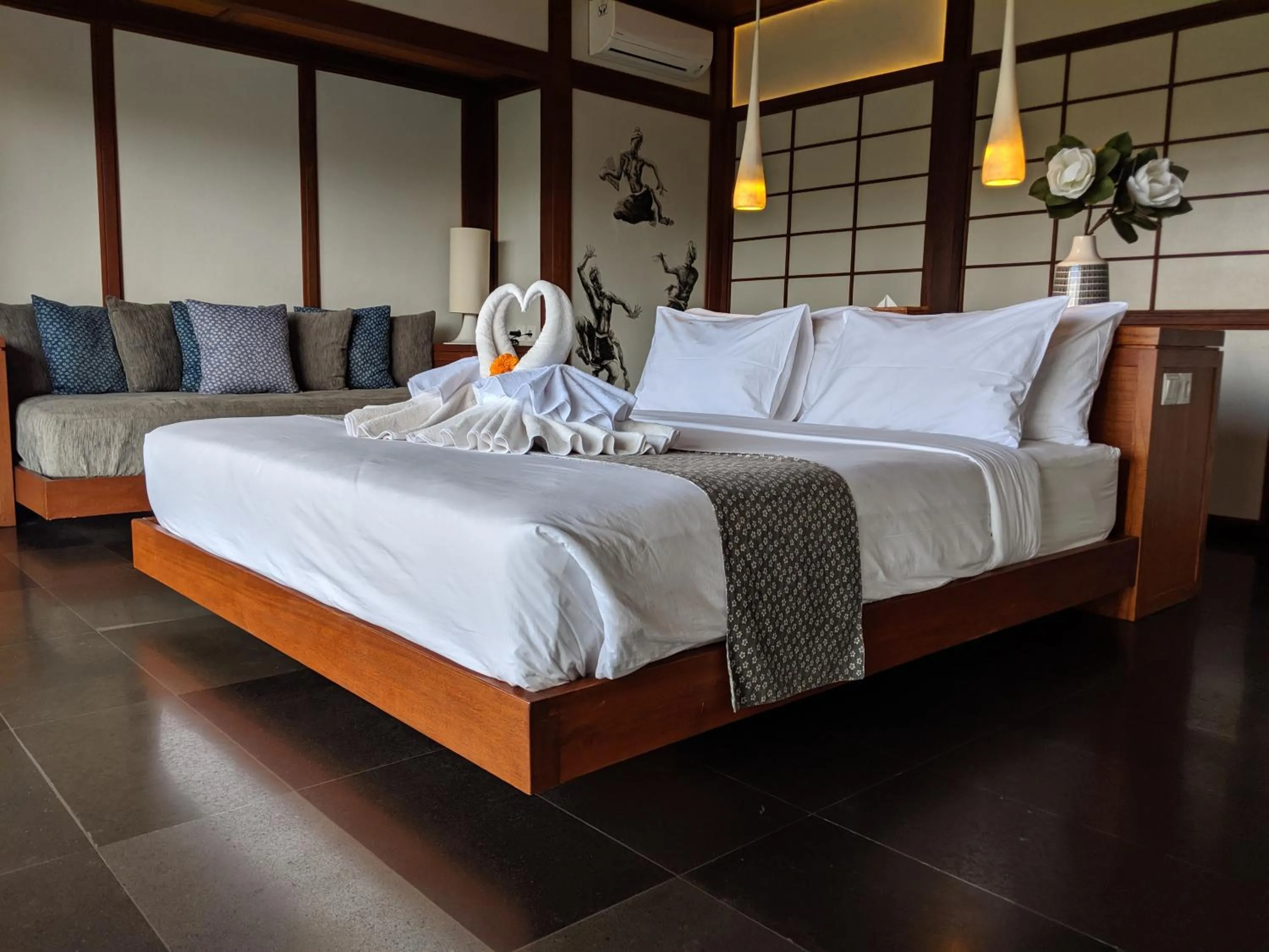 Bed in Suarapura Resort & Spa