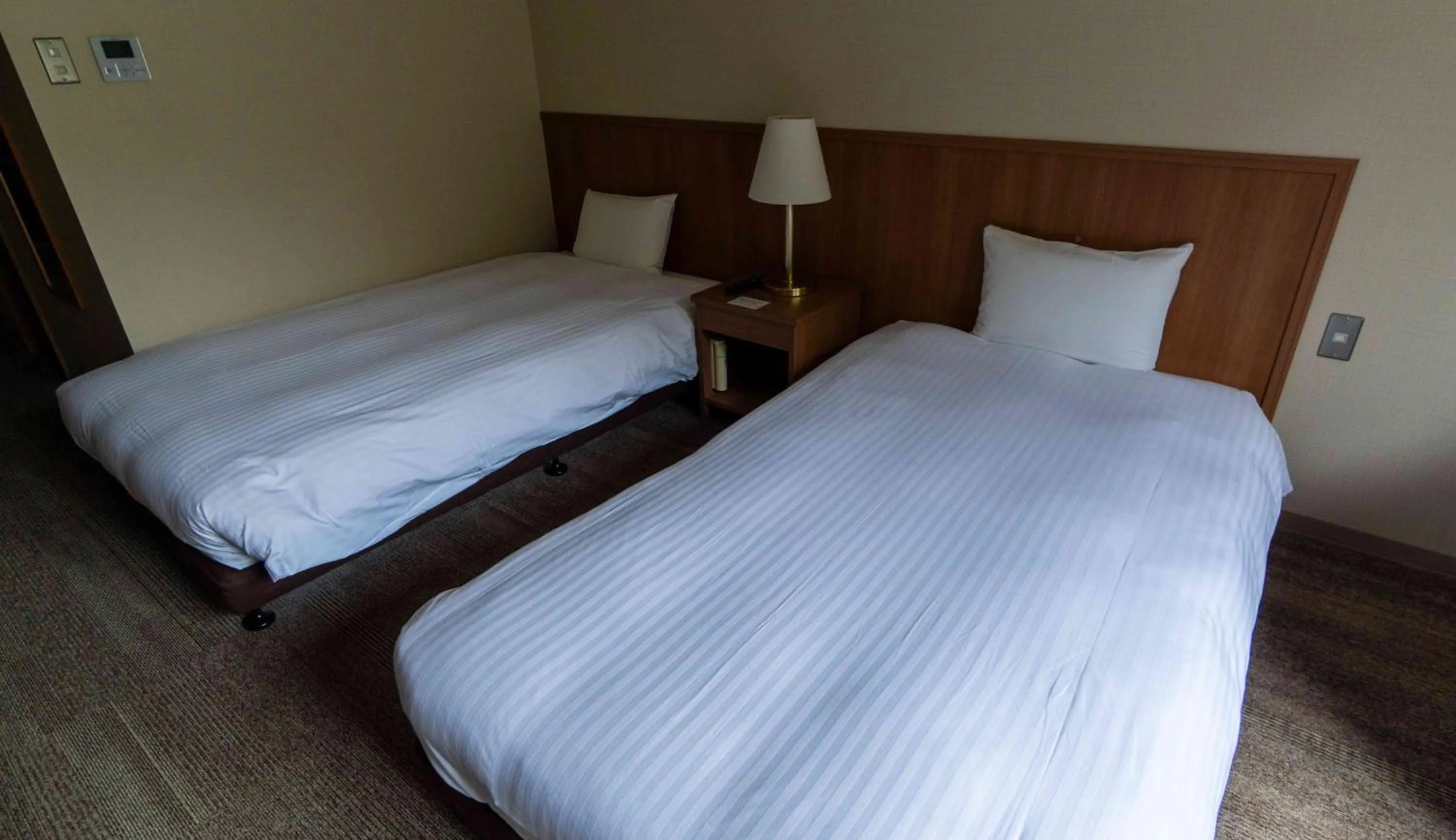 Bed in Motosu Phoenix Hotel