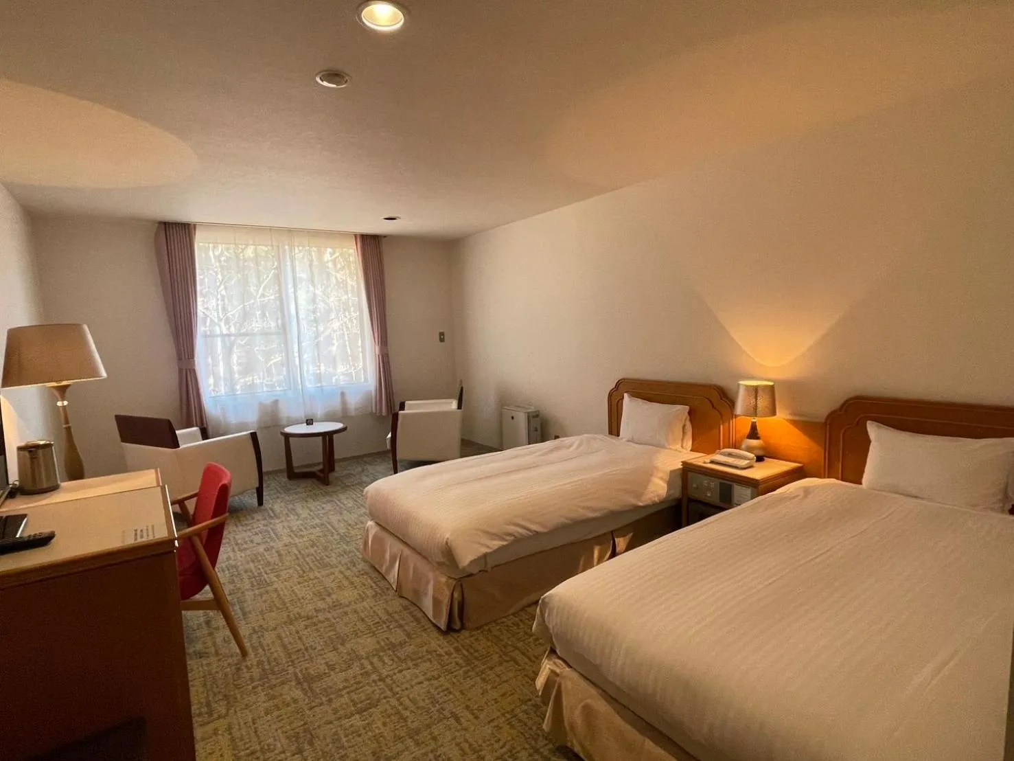 Bed in Motosu Phoenix Hotel