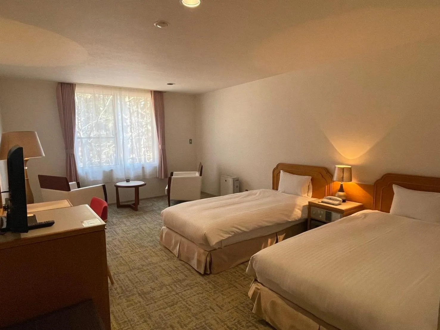 Bed in Motosu Phoenix Hotel