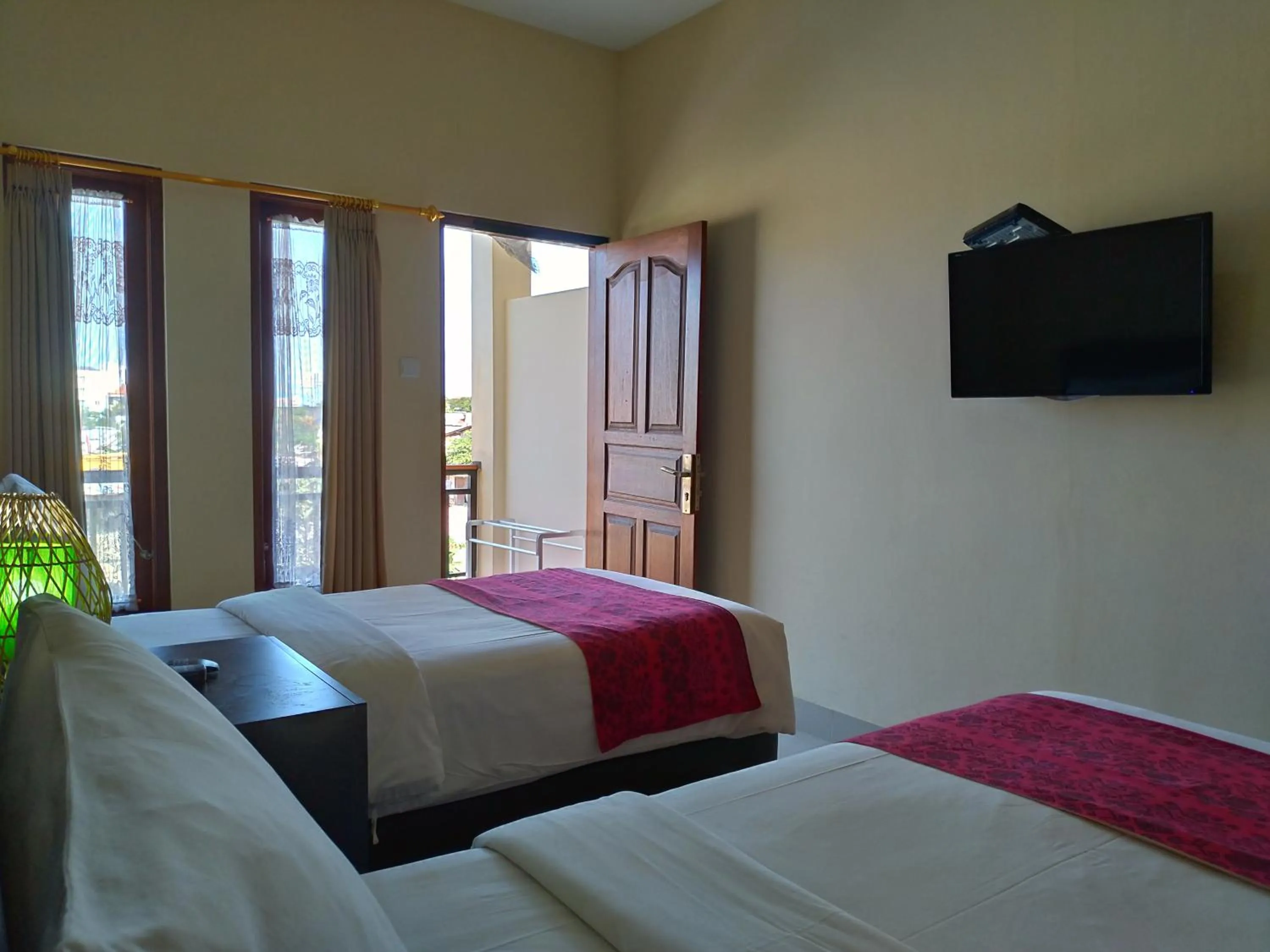 TV and multimedia, Bed in Beji Ayu Homestay