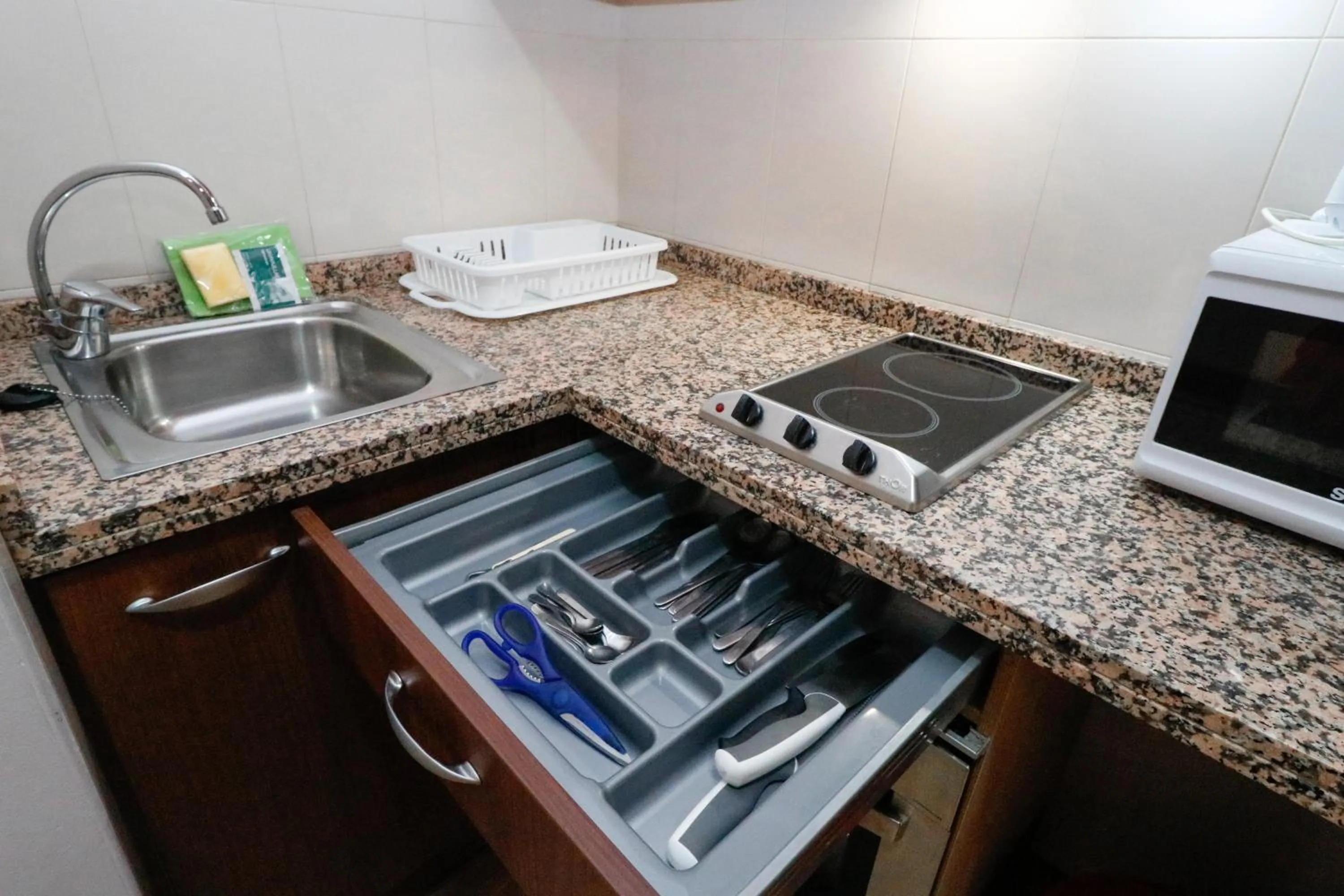 Kitchen or kitchenette in Apartamentos Araco 3000